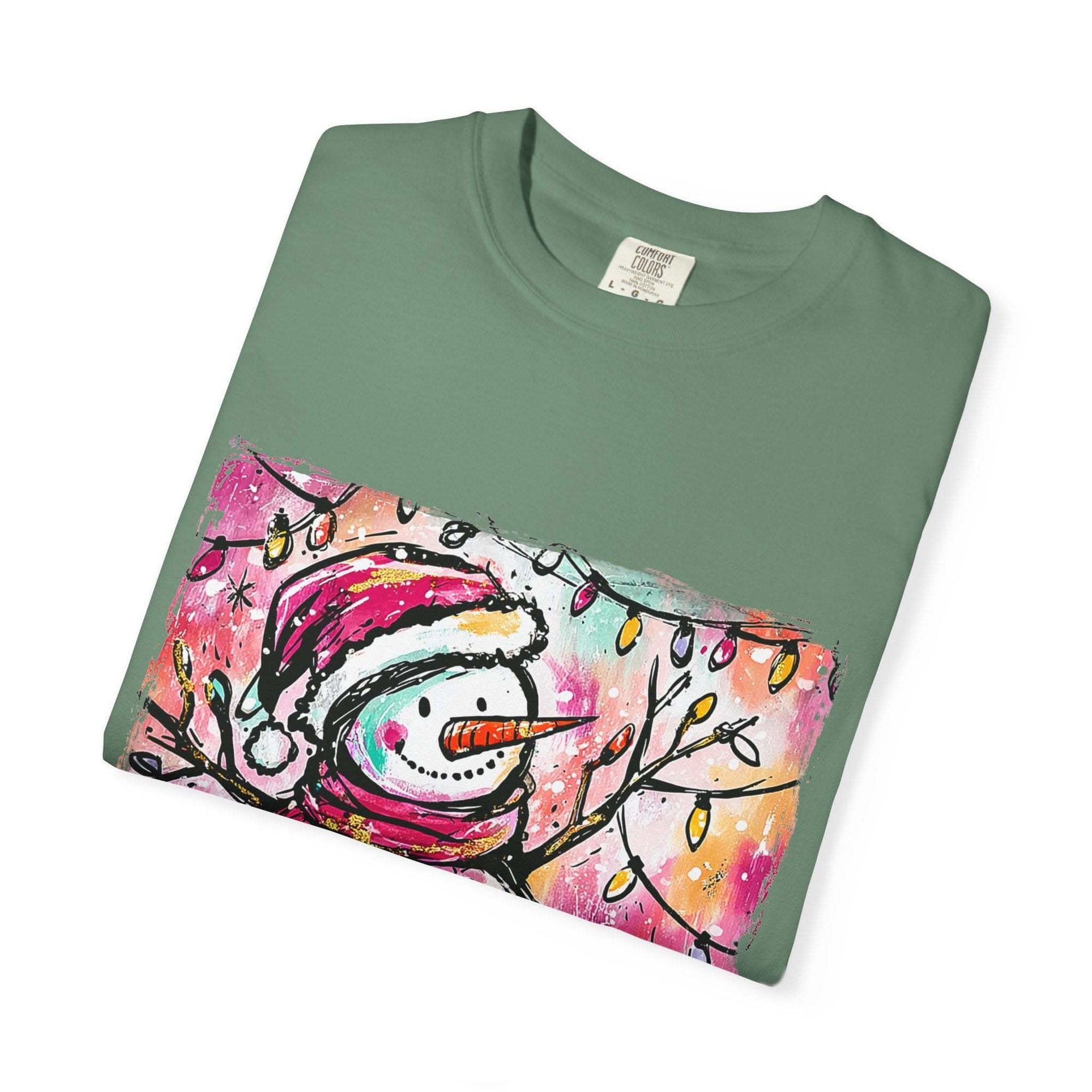White unisex t-shirt featuring colorful disco ball snowman design, perfect for Christmas and dance parties by Printify