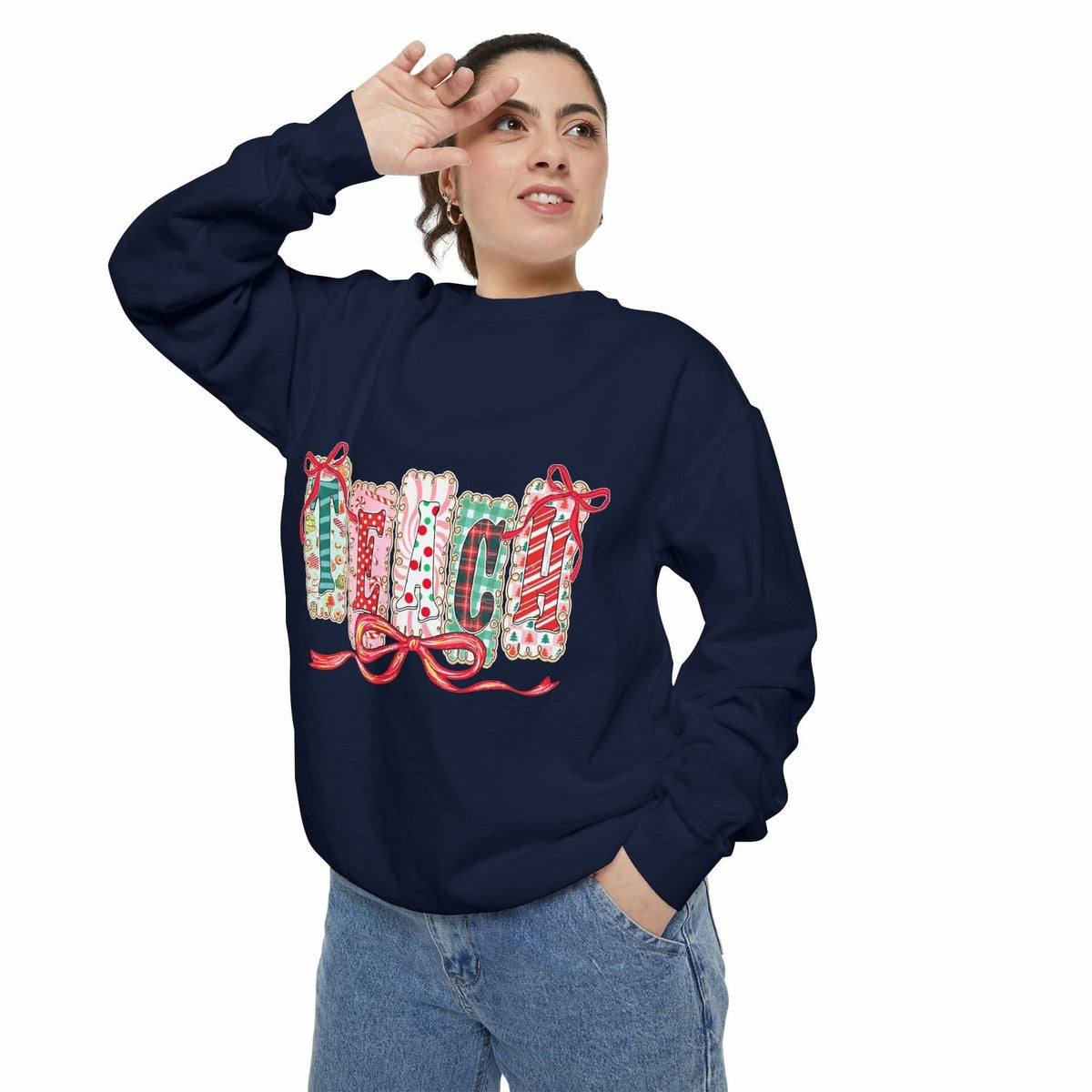 woman wearing navy blue sweatshirt preppy teach christmas with festive holiday design