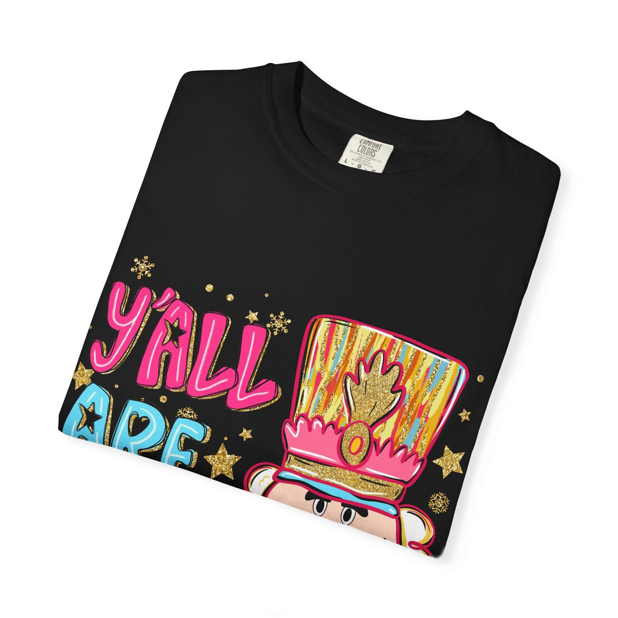 Black Yall Are Nuts Nutcracker festive cotton T-shirt with colorful nutcracker design and playful text