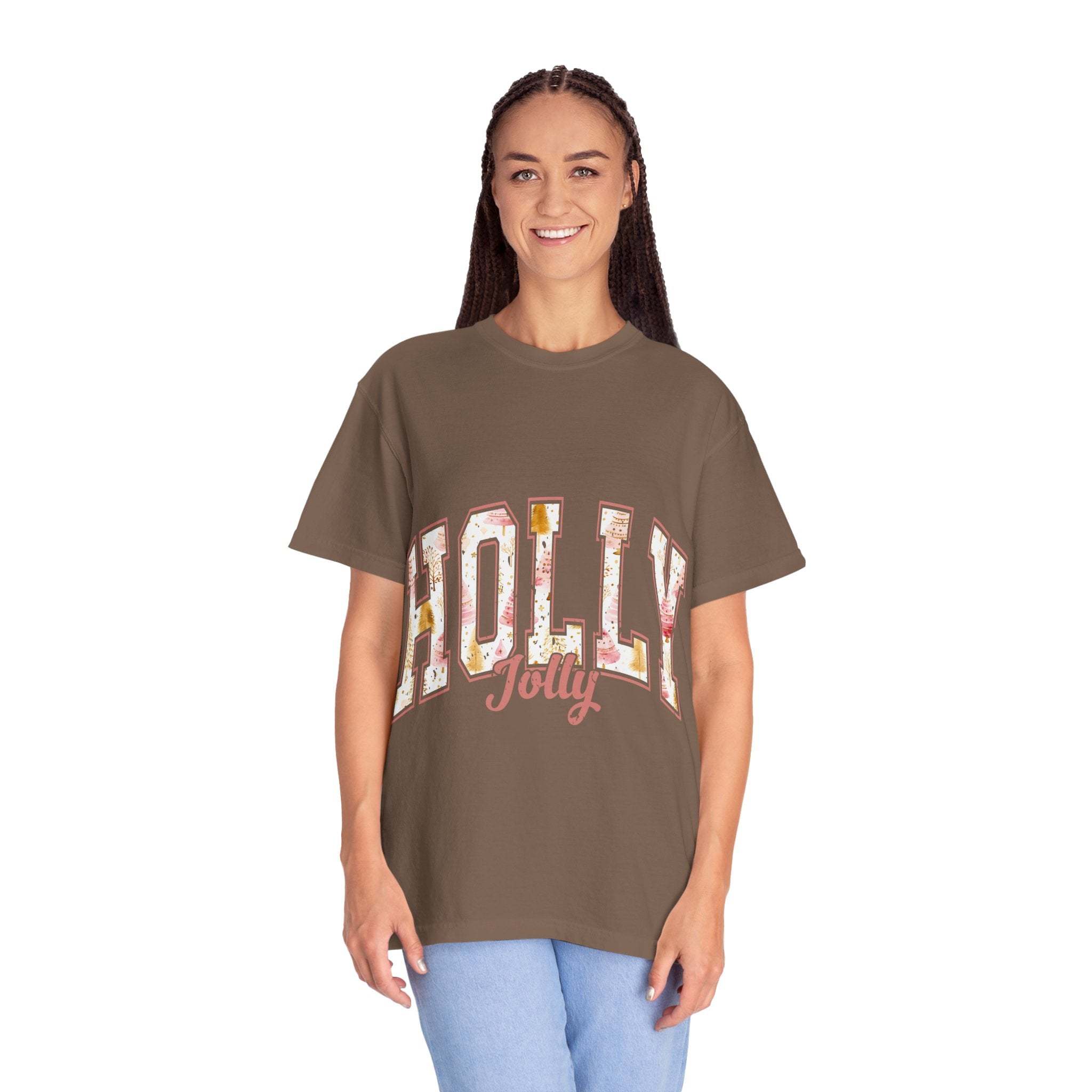 Woman wearing a brown Varsity Holly Jolly T-shirt with festive design and relaxed fit.