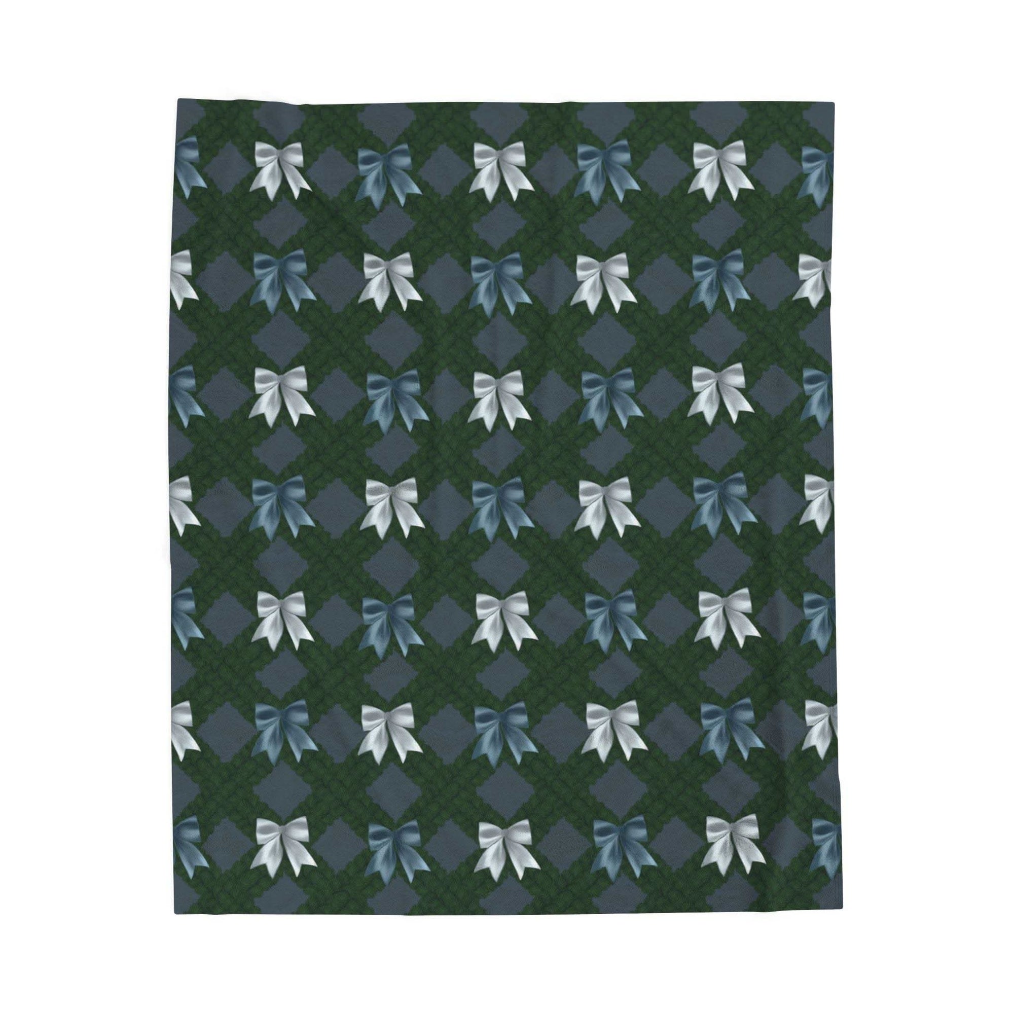 Velveteen plush blanket with winter coquette bow pattern draped on sofa for cozy comfort