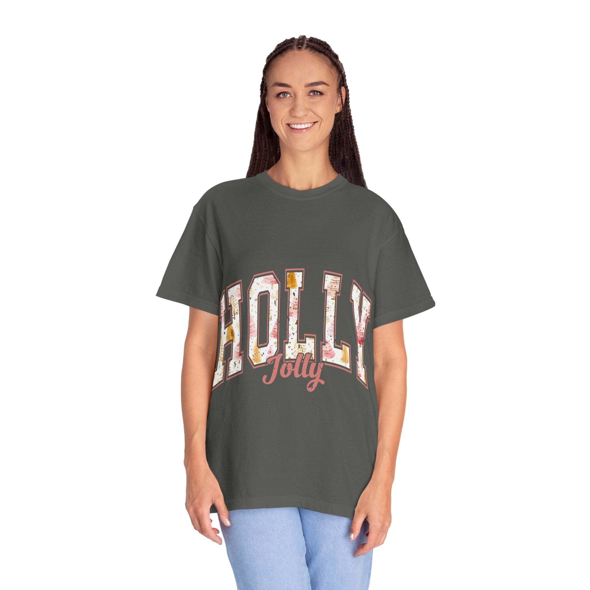 Woman wearing a charcoal gray Varsity Holly Jolly T-shirt with festive lettering and relaxed fit