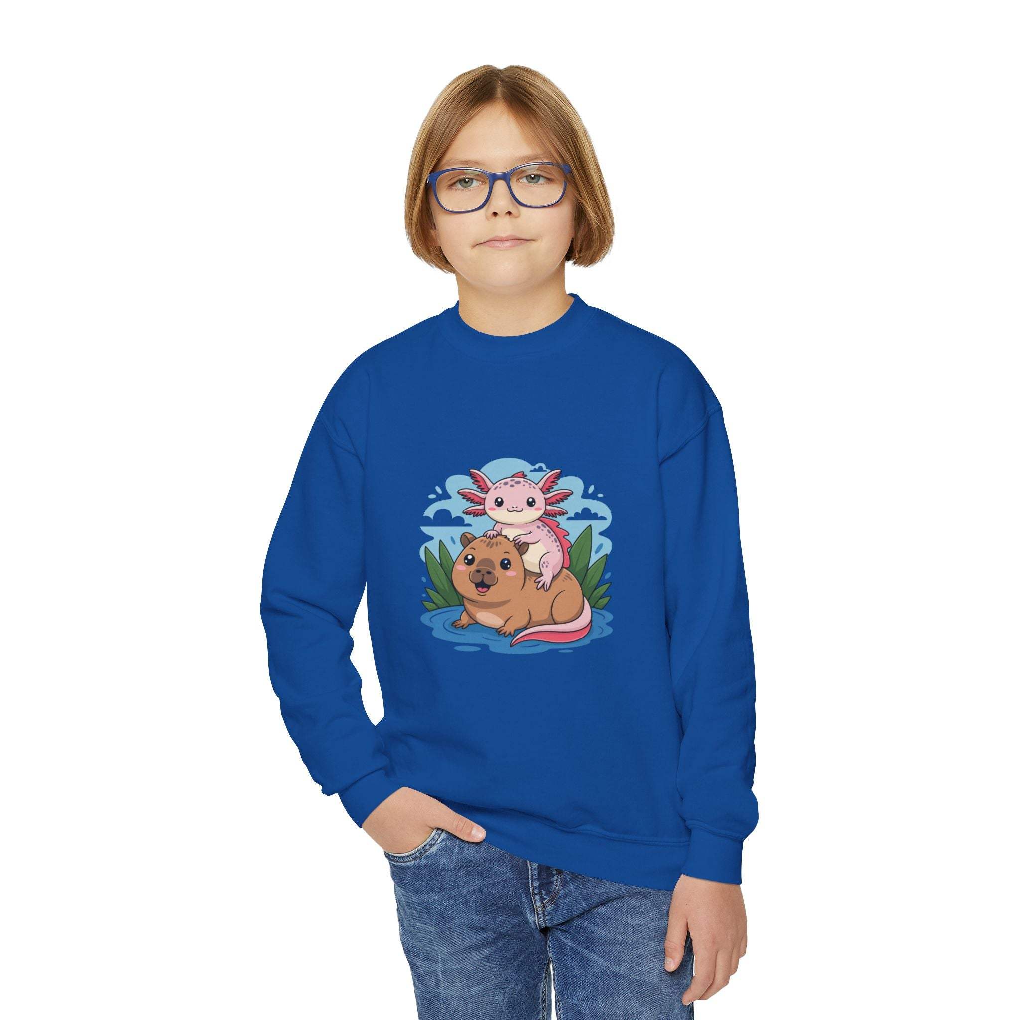 Child wearing a blue sweatshirt with a cartoon design on a white background