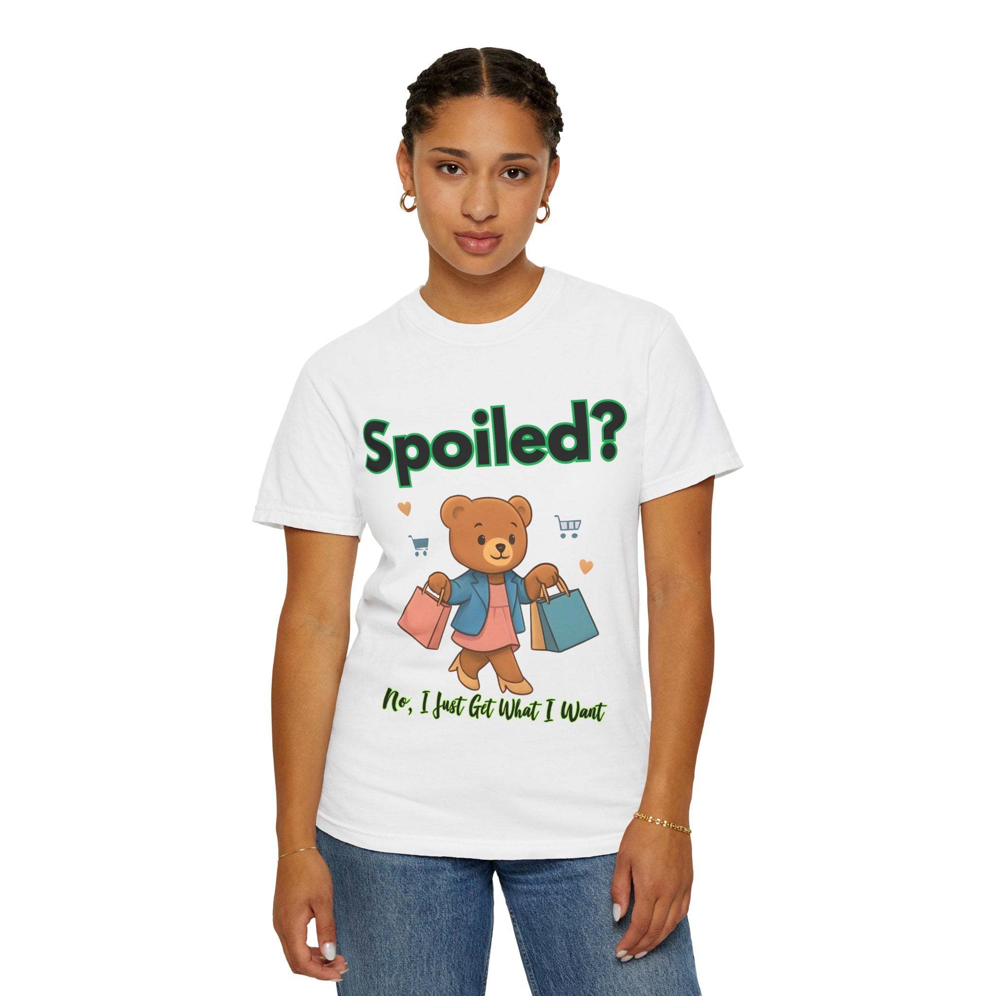 Woman wearing white Spoiled No I Just Get What I Want T-shirt with bear graphic and shopping bags