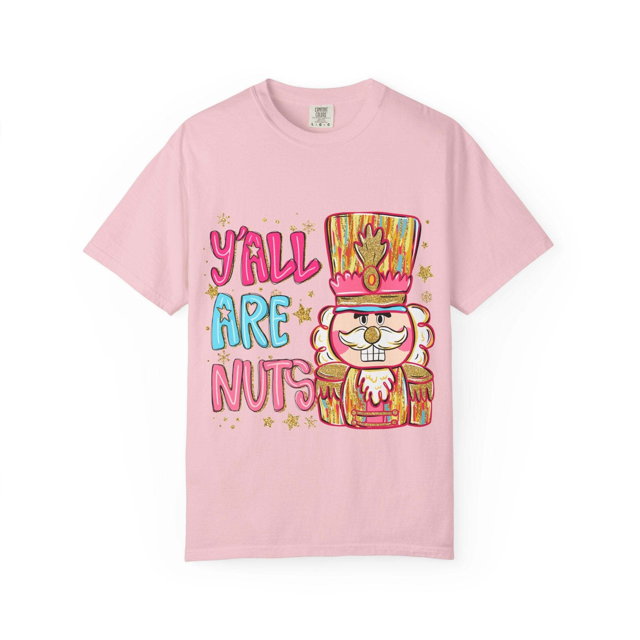 Pink Yall Are Nuts Nutcracker graphic T-shirt with festive design and relaxed fit