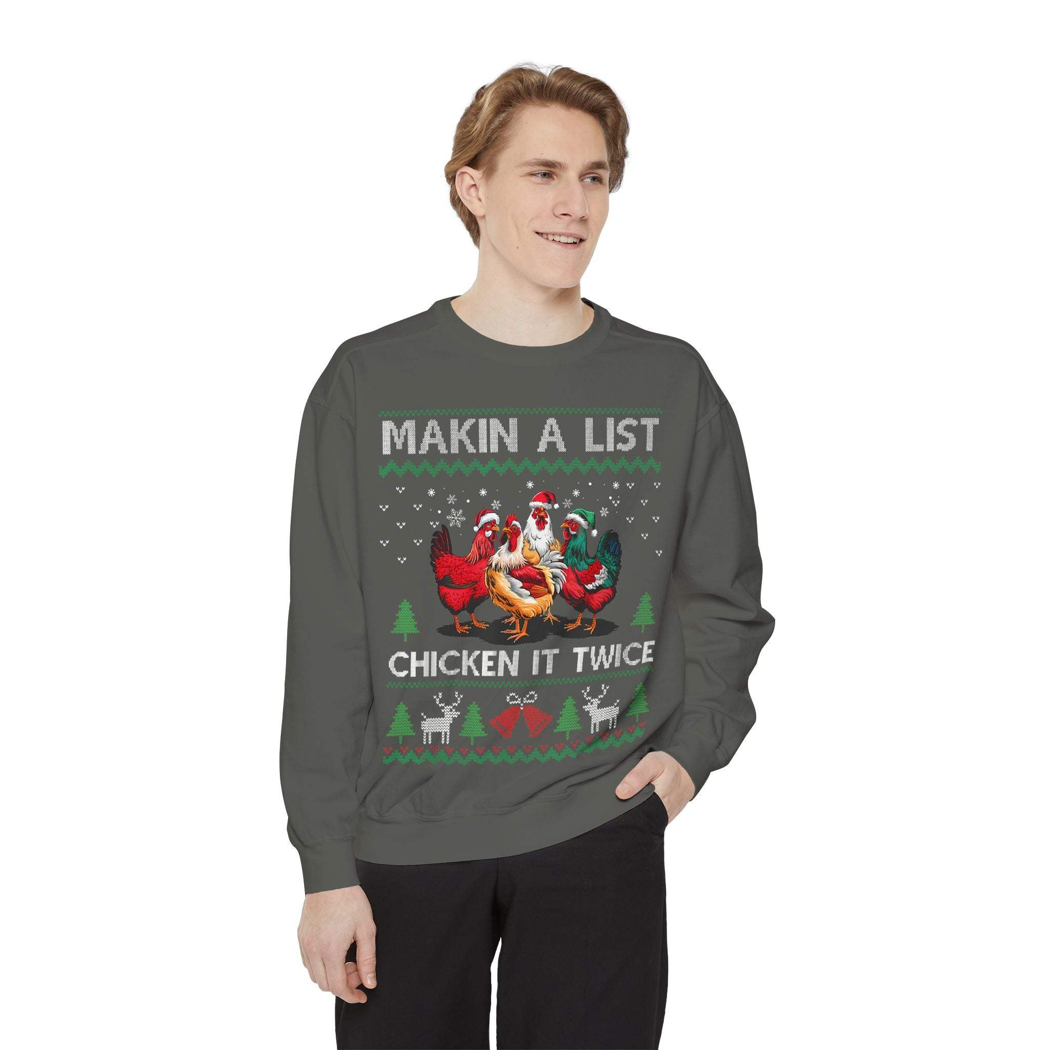 Garment-dyed sweatshirt with "Making a List, Chicken it Twice" holiday chicken design worn by smiling man