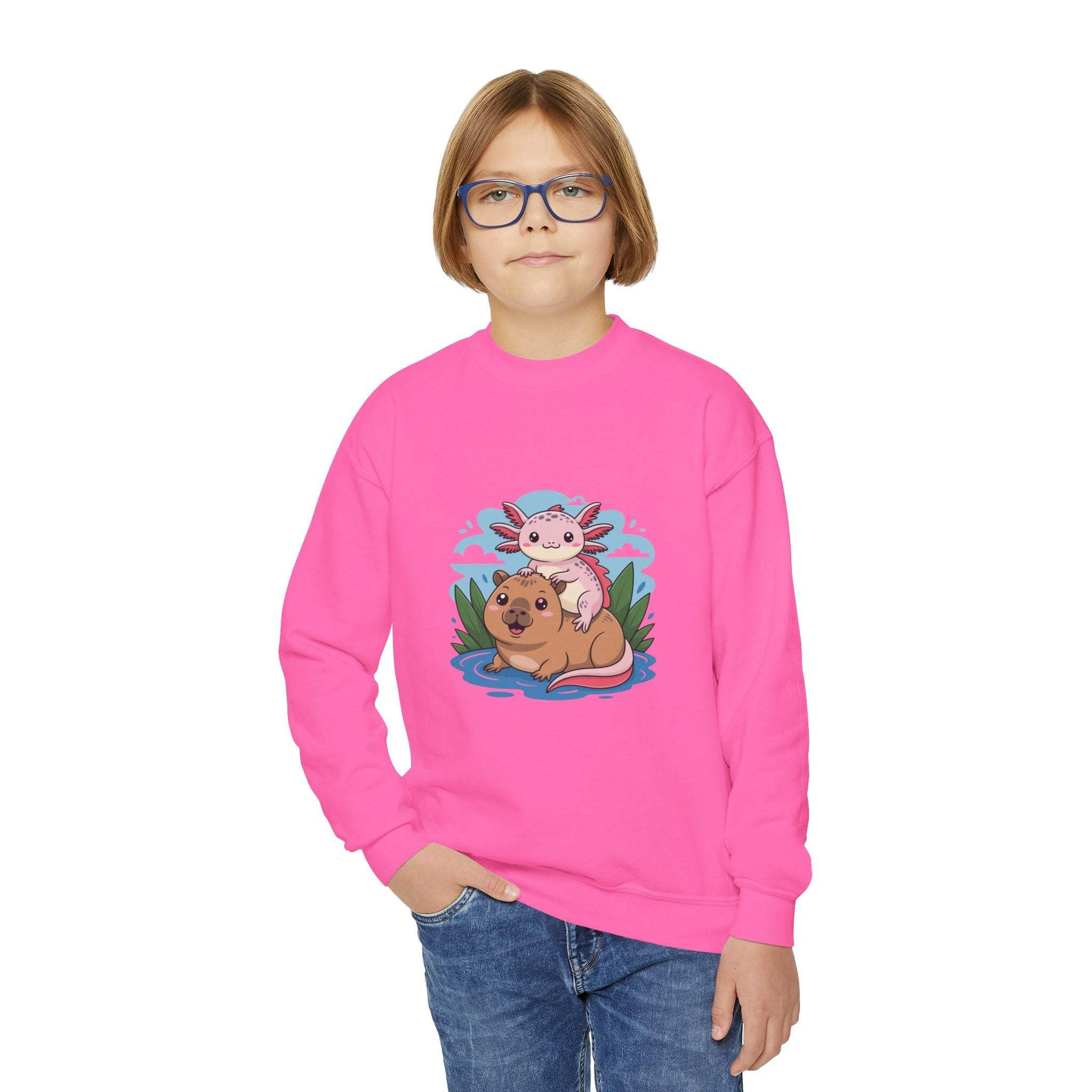 Child wearing a pink sweatshirt with a graphic design on a white background