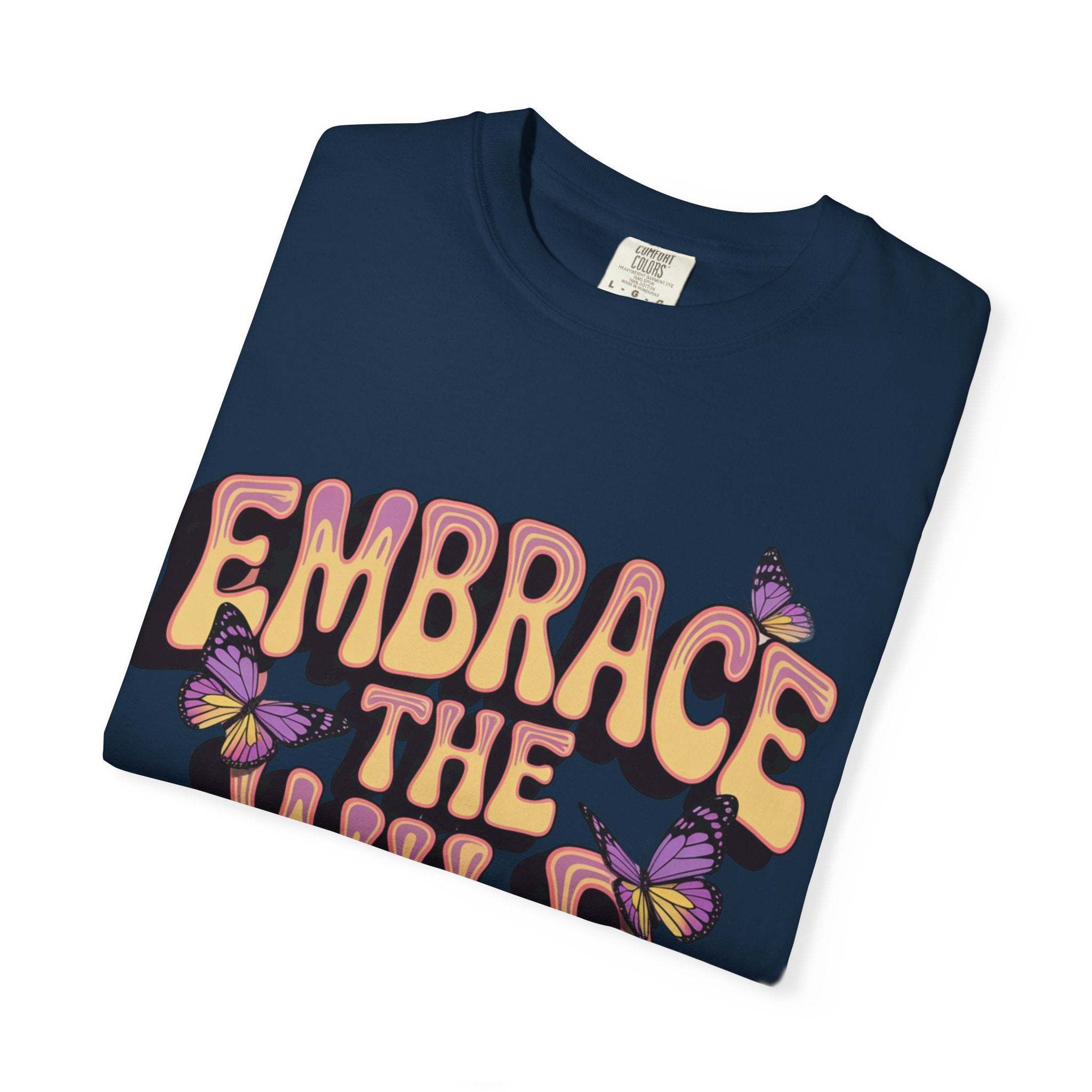 Navy garment-dyed T-shirt with "Embrace the Wild Side" print and butterfly design, unisex cotton tee.