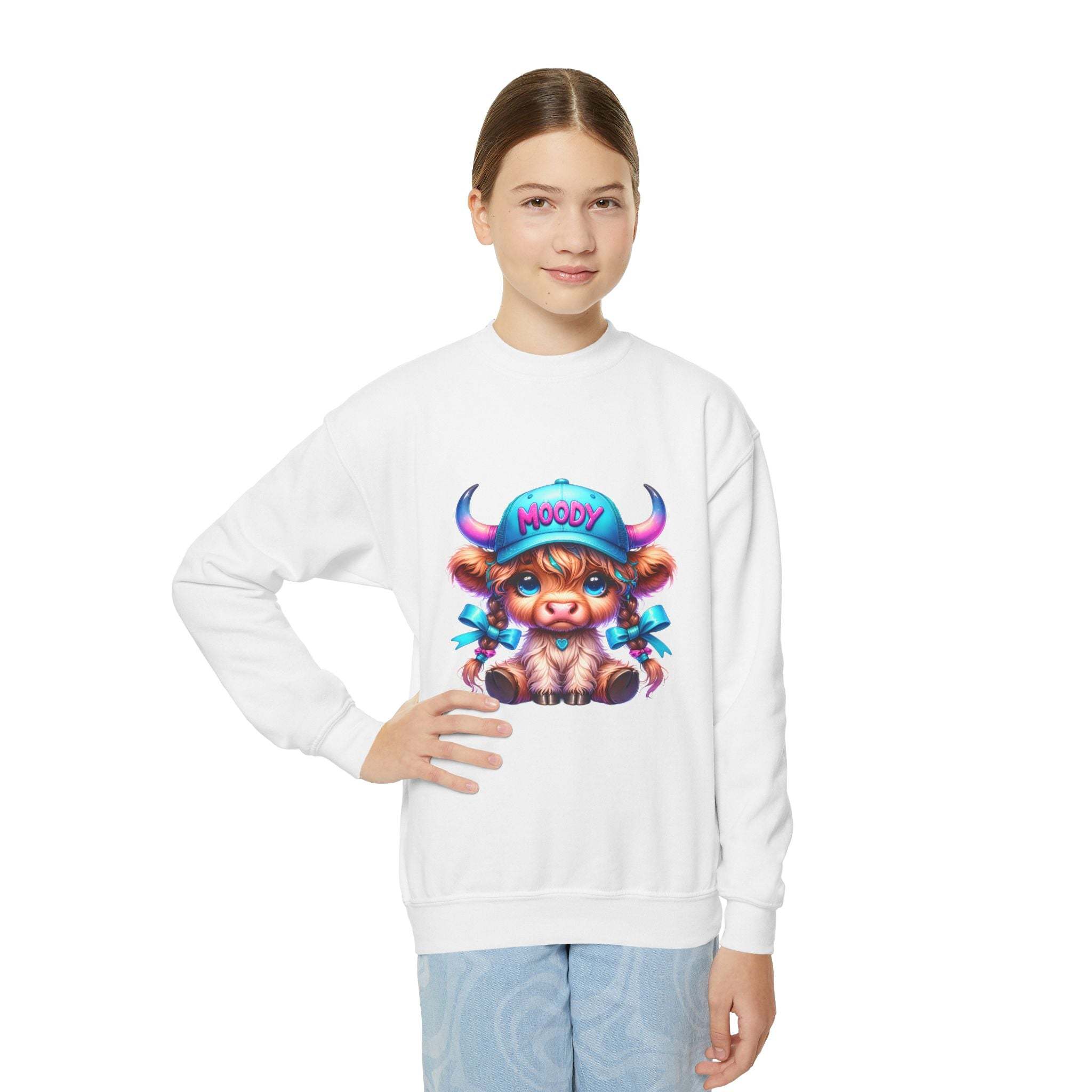 Youth wearing white Moody Girl Highland Cow sweatshirt with colorful cartoon highland cow illustration on front
