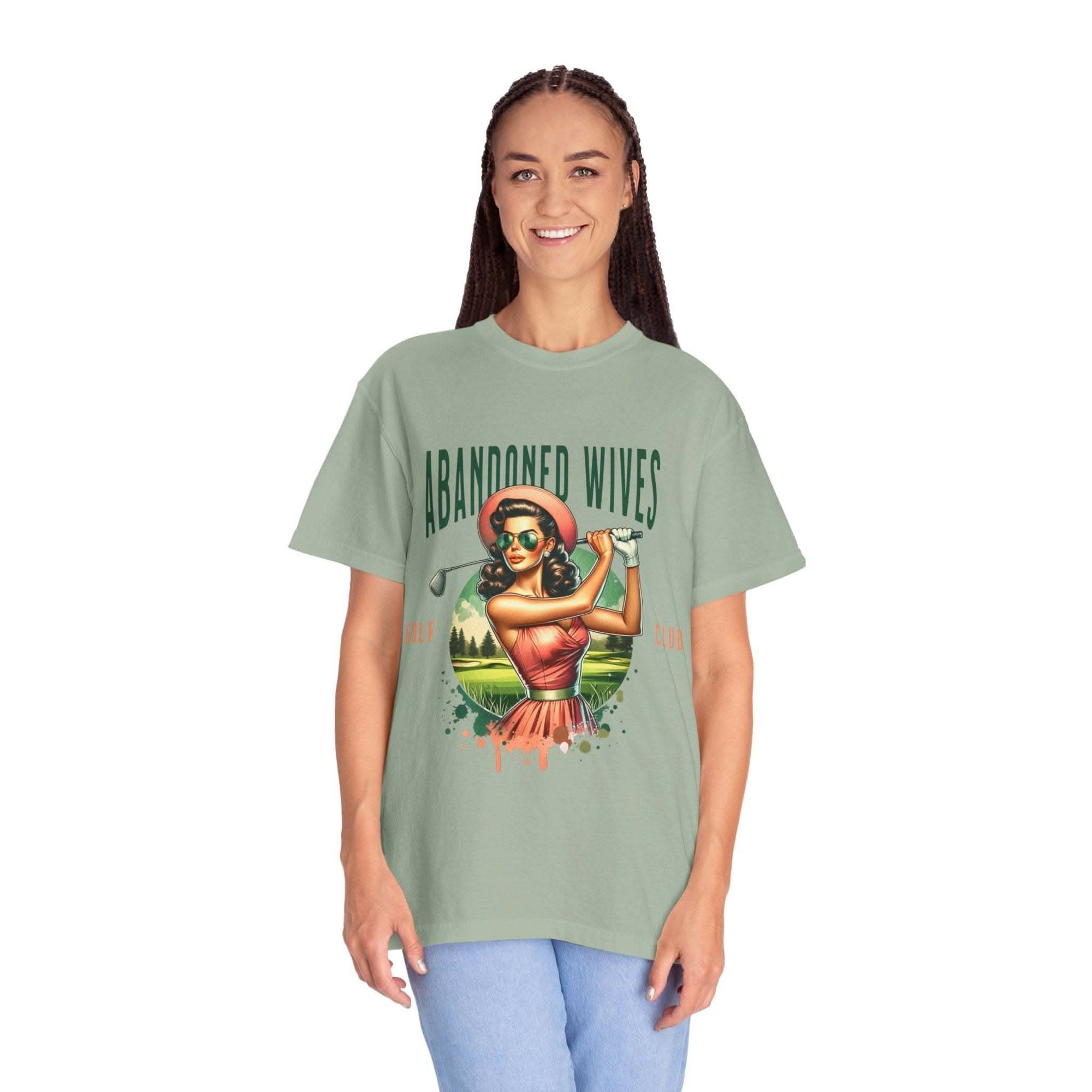 Vintage unisex t-shirt with humorous abandoned wives golf club design, soft garment-dyed cotton in multiple sizes and colors