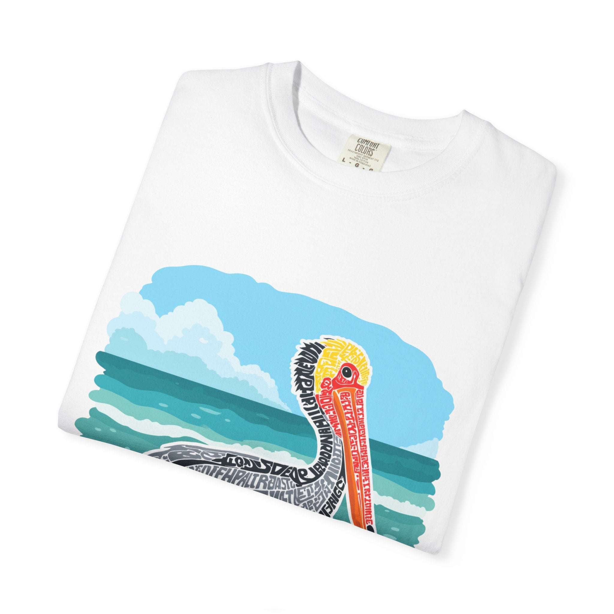 Folded white t-shirt with vintage pelican letter poster graphic and coastal design