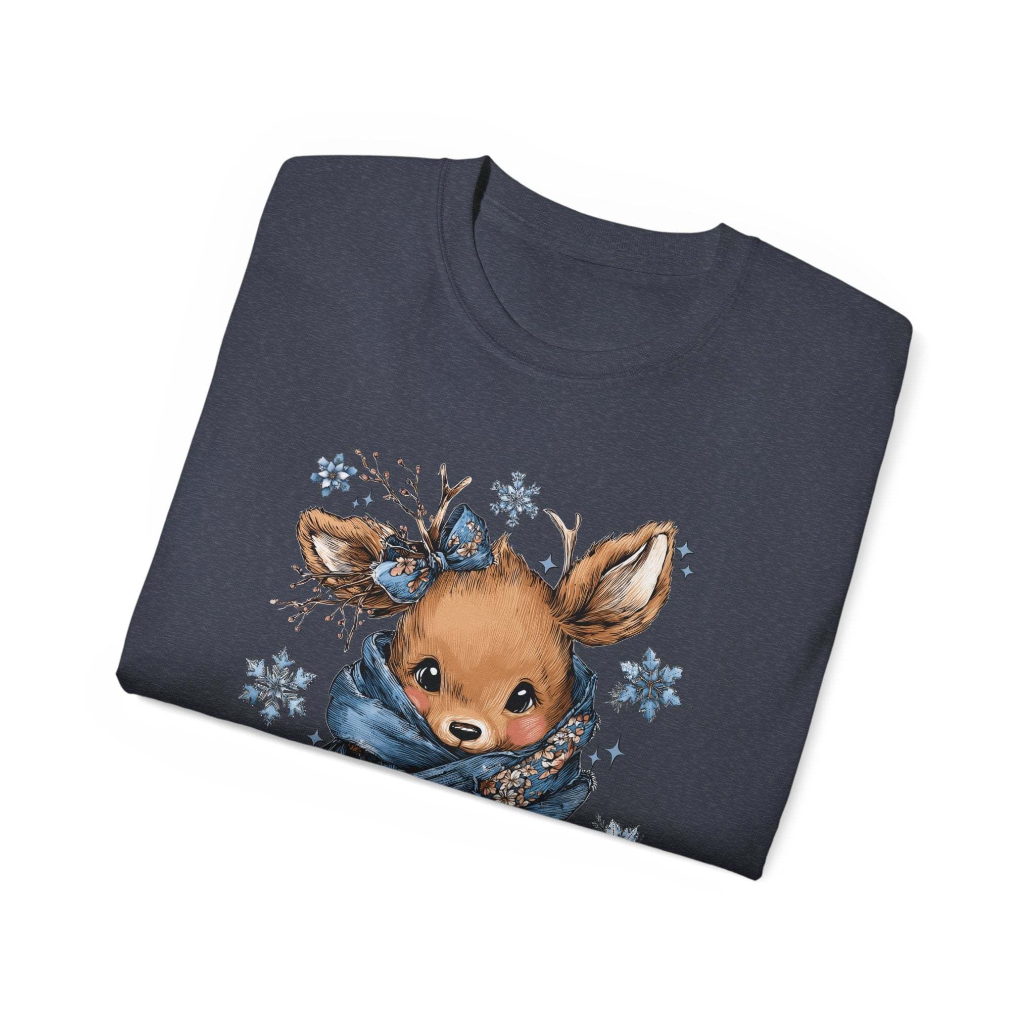 White t-shirt with retro patchwork reindeer design wearing blue scarf and surrounded by snowflakes