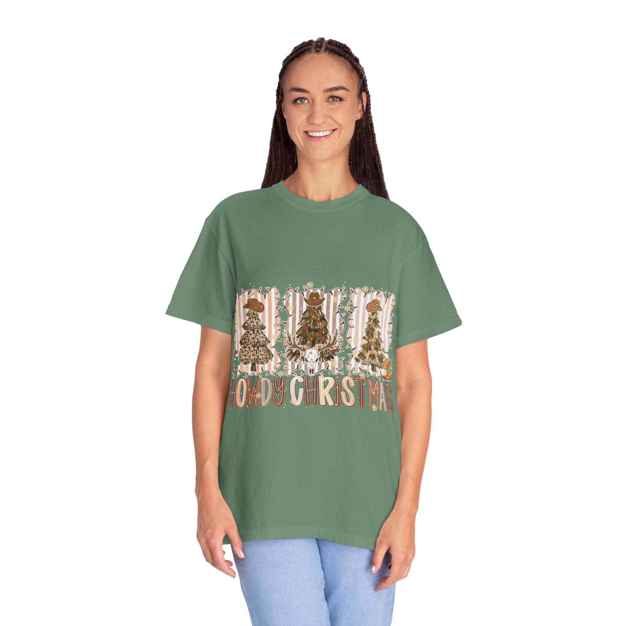 Woman wearing green Cowboy Howdy Christmas t-shirt with festive cowboy-themed design