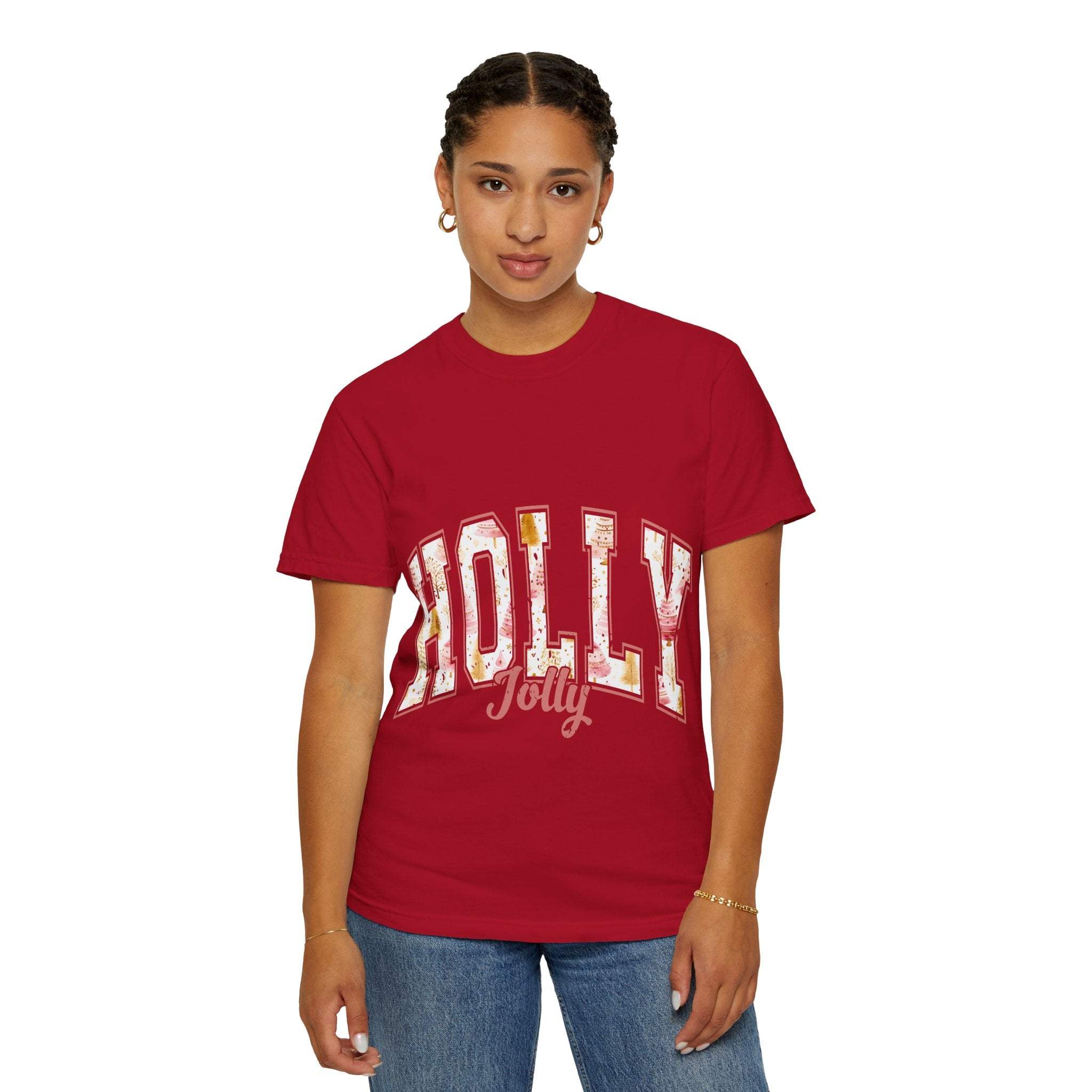 Woman wearing red Varsity Holly Jolly T-shirt with festive lettering and relaxed fit