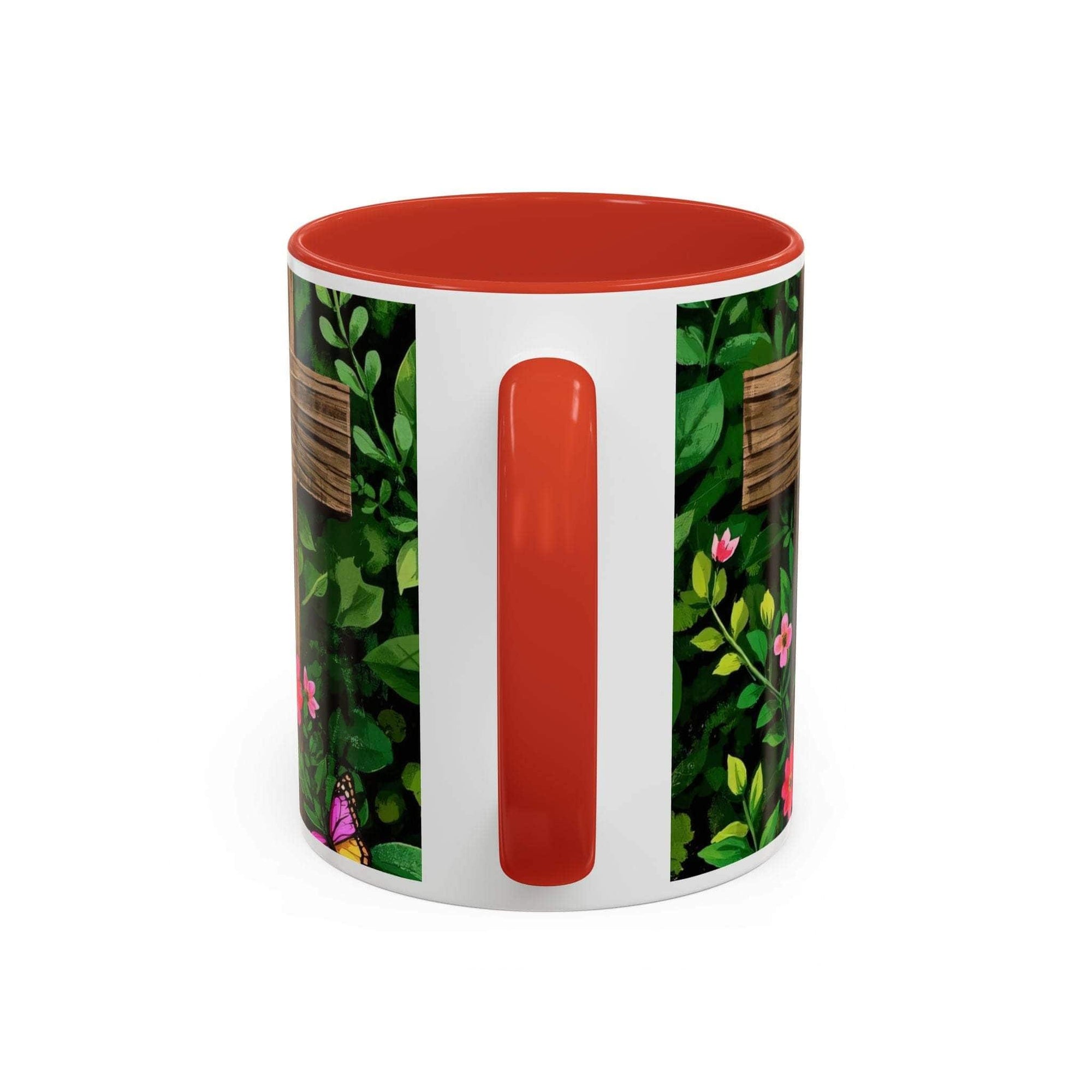Mug with floral design and red interior on a white background