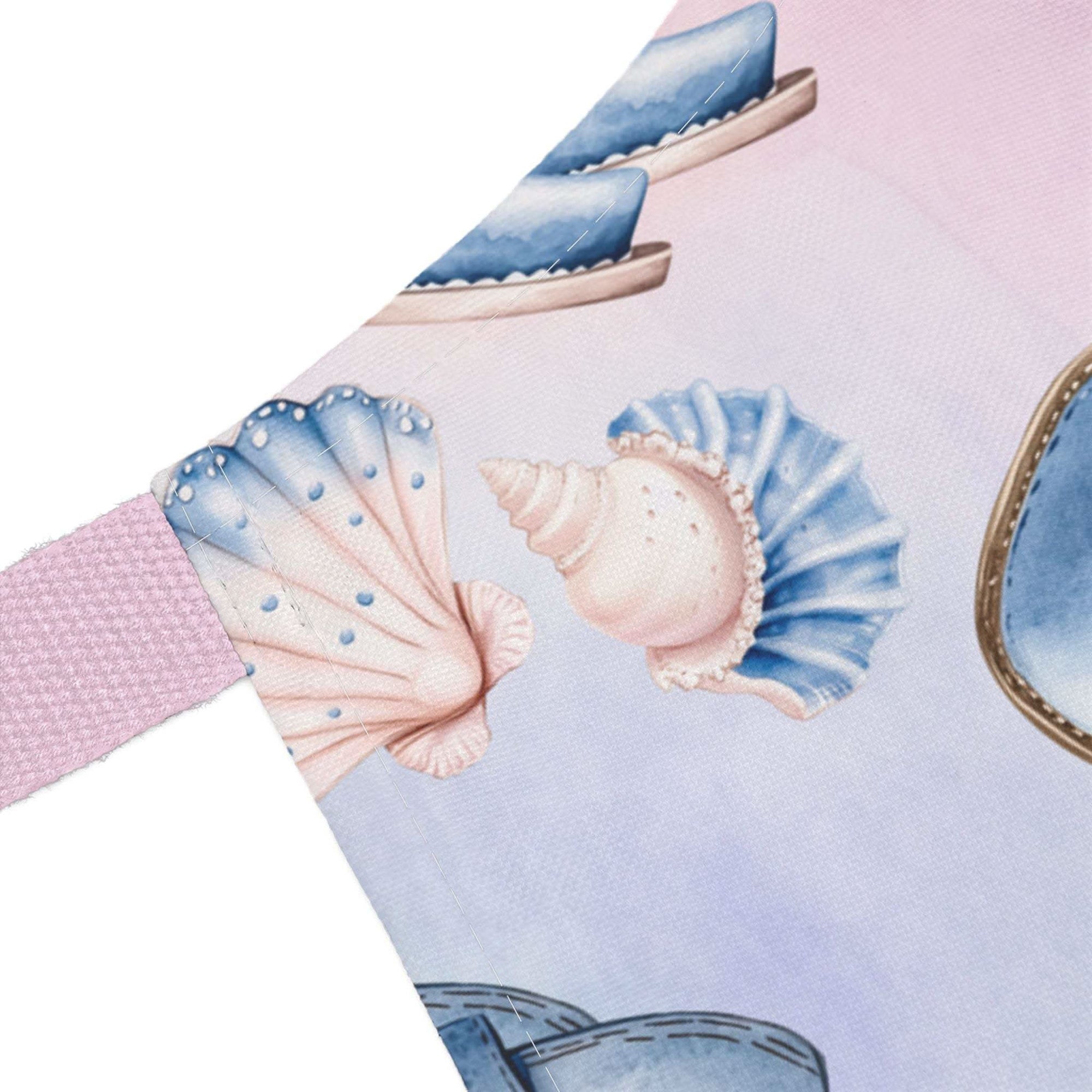 Pastel Coastal Cowgirl apron with seashell design and pink strap, beach-themed kitchen accessory