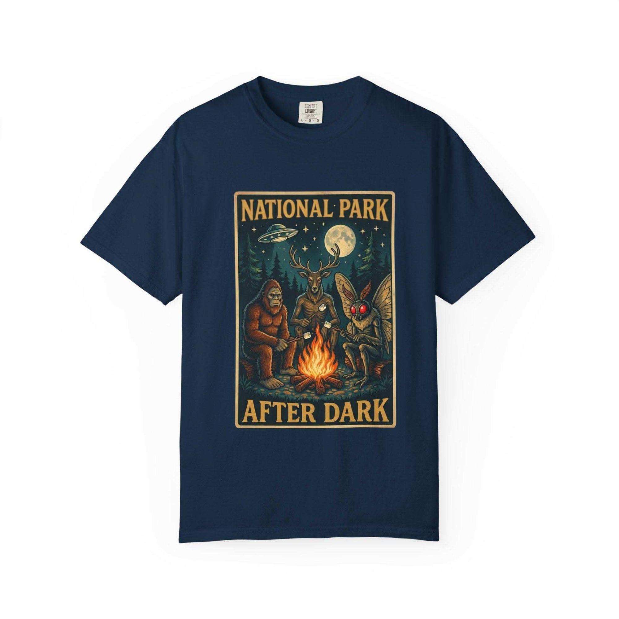National Park After Dark t-shirt featuring campfire, Sasquatch, and Mothman nocturnal scene