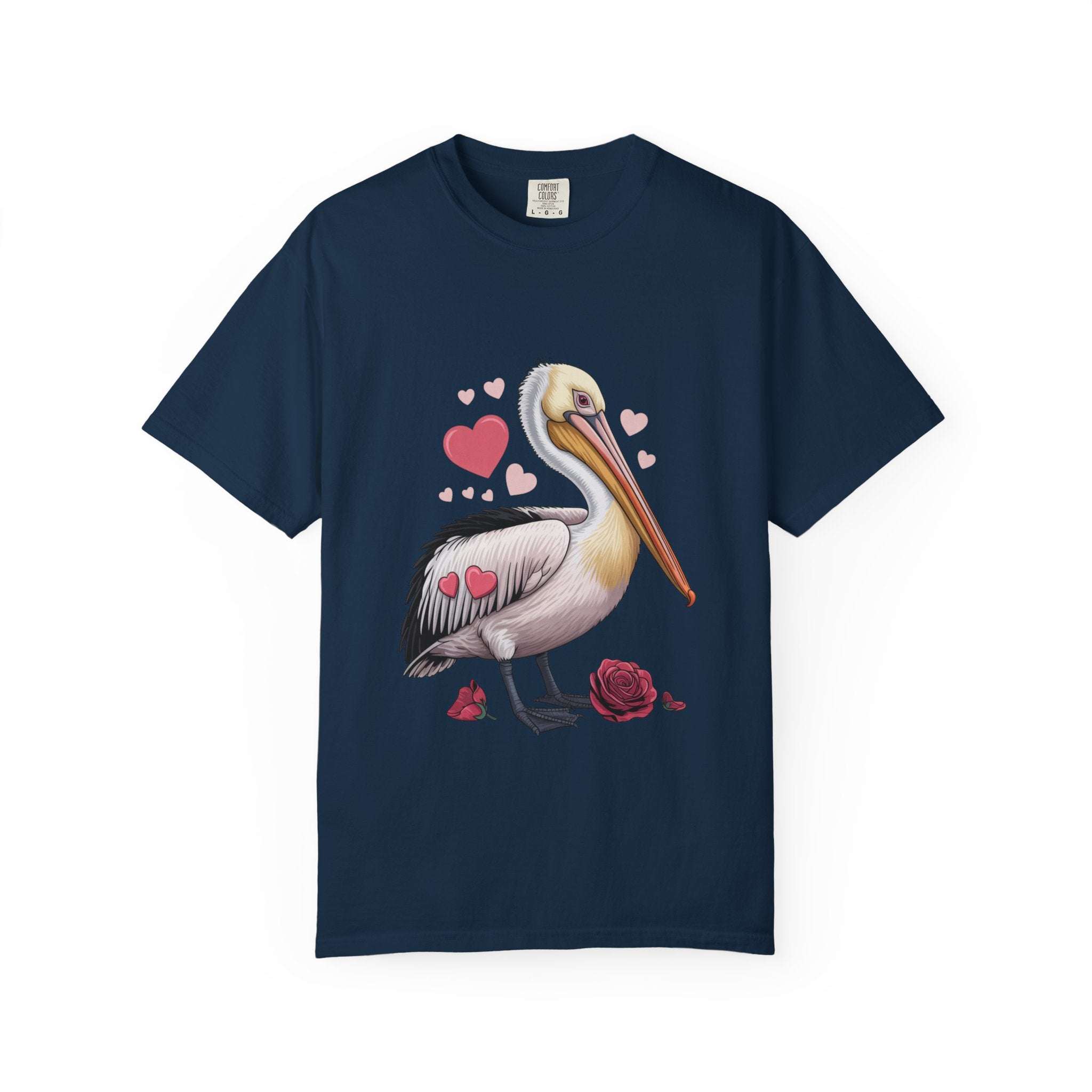Valentine Pelican Hearts T-Shirt with pelican carrying heart on sunlit shoreline, soft vintage-style cotton and relaxed fit