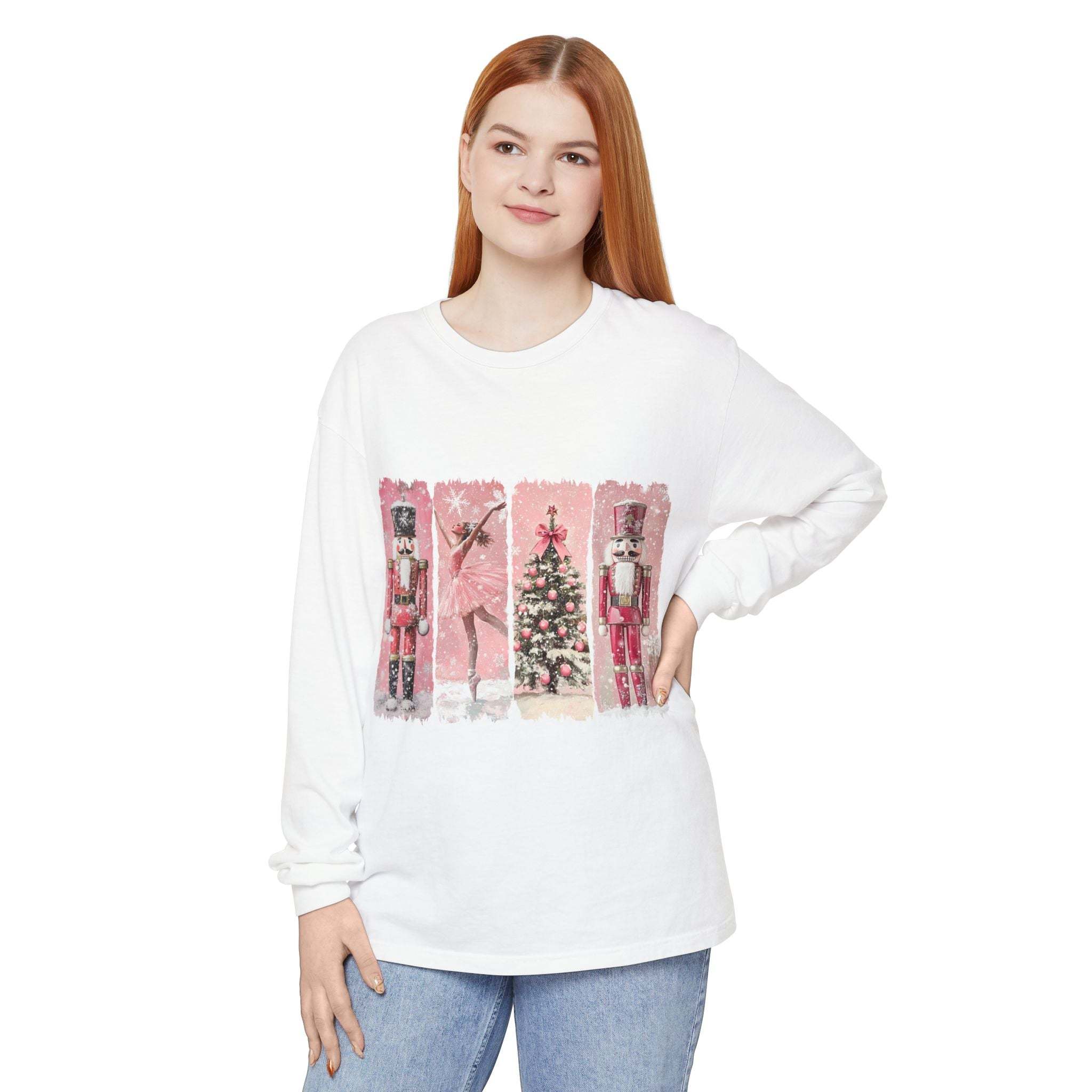 Long sleeve t-shirt with pink Christmas Nutcracker watercolor swatches design on white fabric worn by woman