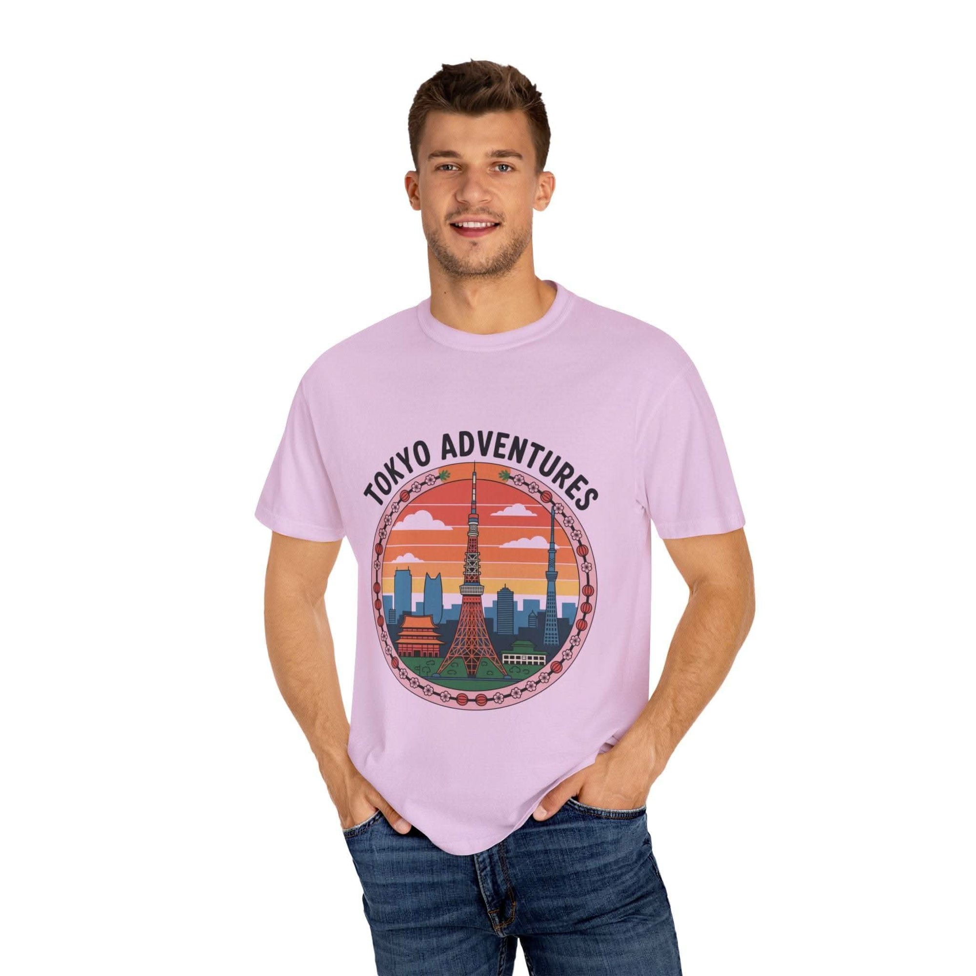 Garment-dyed Tokyo Adventures travel t-shirt with graphic print worn by smiling man