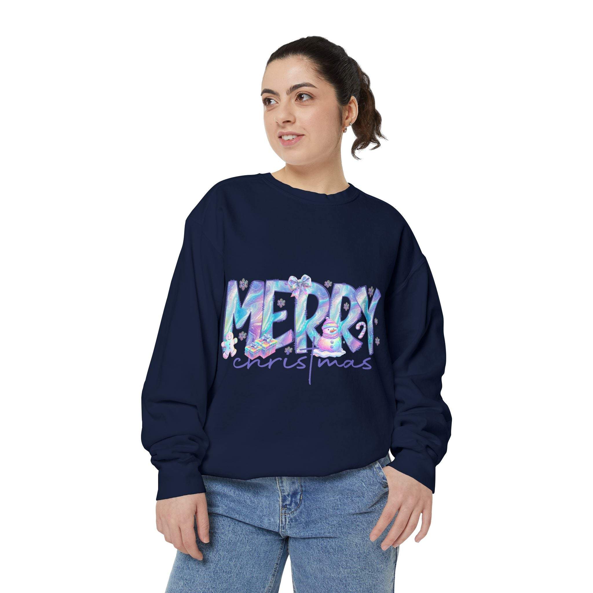 woman wearing navy sweatshirt with iridescent Merry Christmas design and jeans