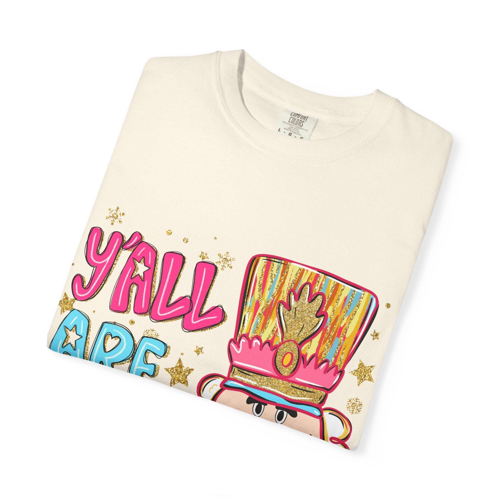 White Yall Are Nuts Nutcracker T-shirt with colorful festive design and playful text