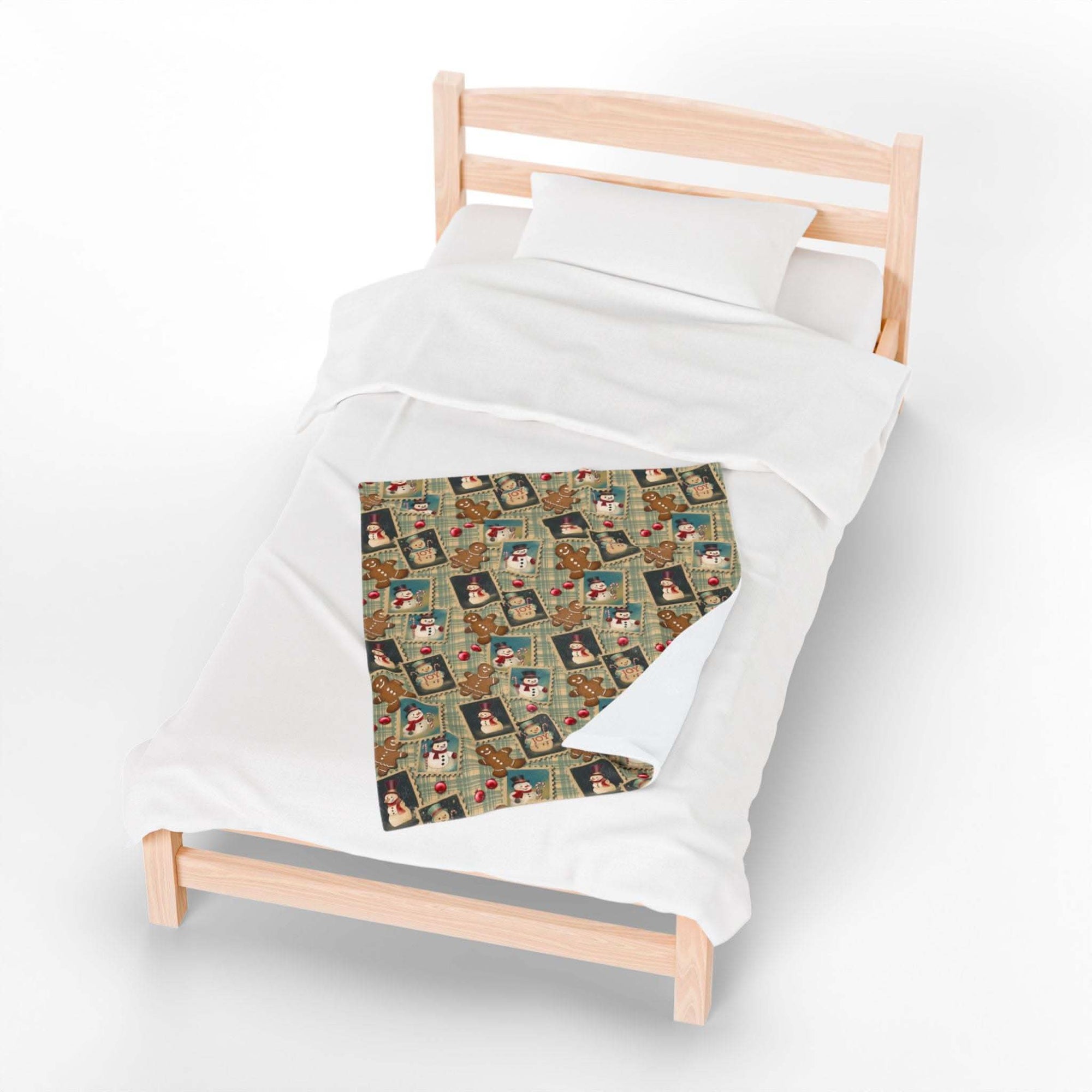 Cozy retro Christmas watercolor plush blanket on bed with festive holiday design