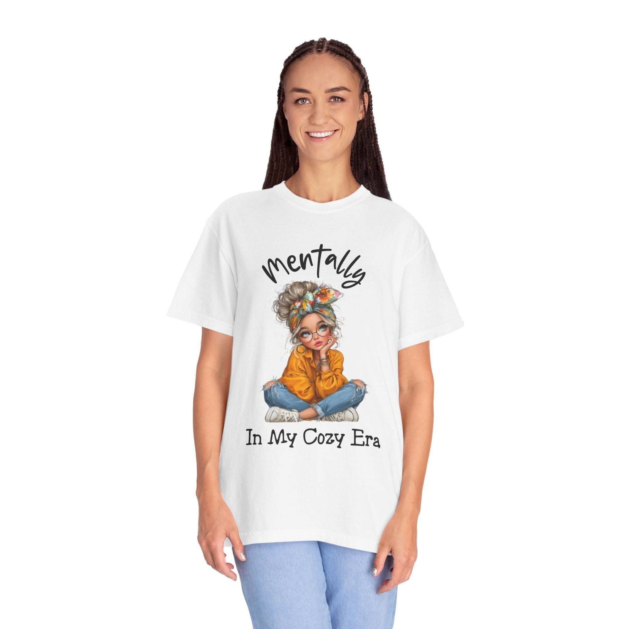 Person wearing a white t-shirt with a graphic and text on a white background