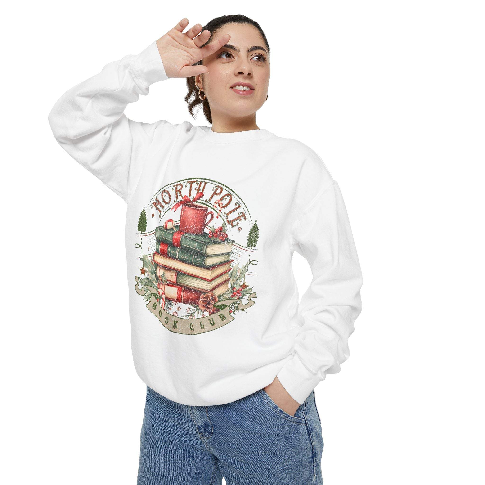 Woman wearing white Vintage North Pole Book Club sweatshirt with holiday book stack design