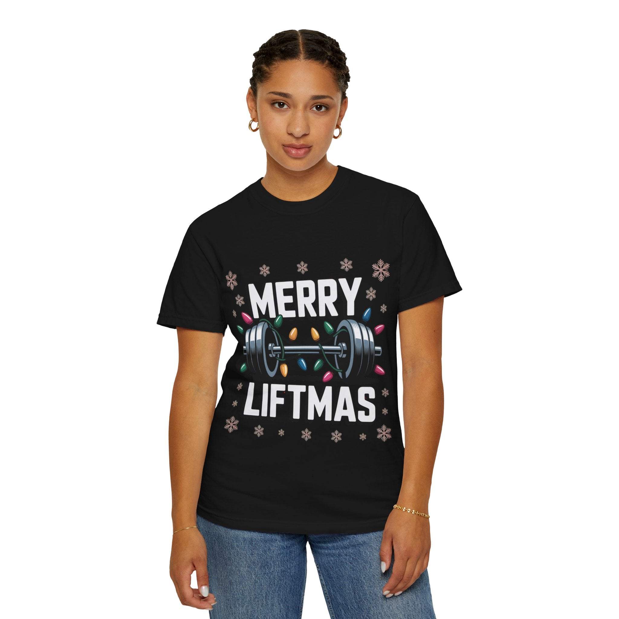 Christmas Workout T-shirt black Merry Liftmas design with barbell and holiday lights worn by woman