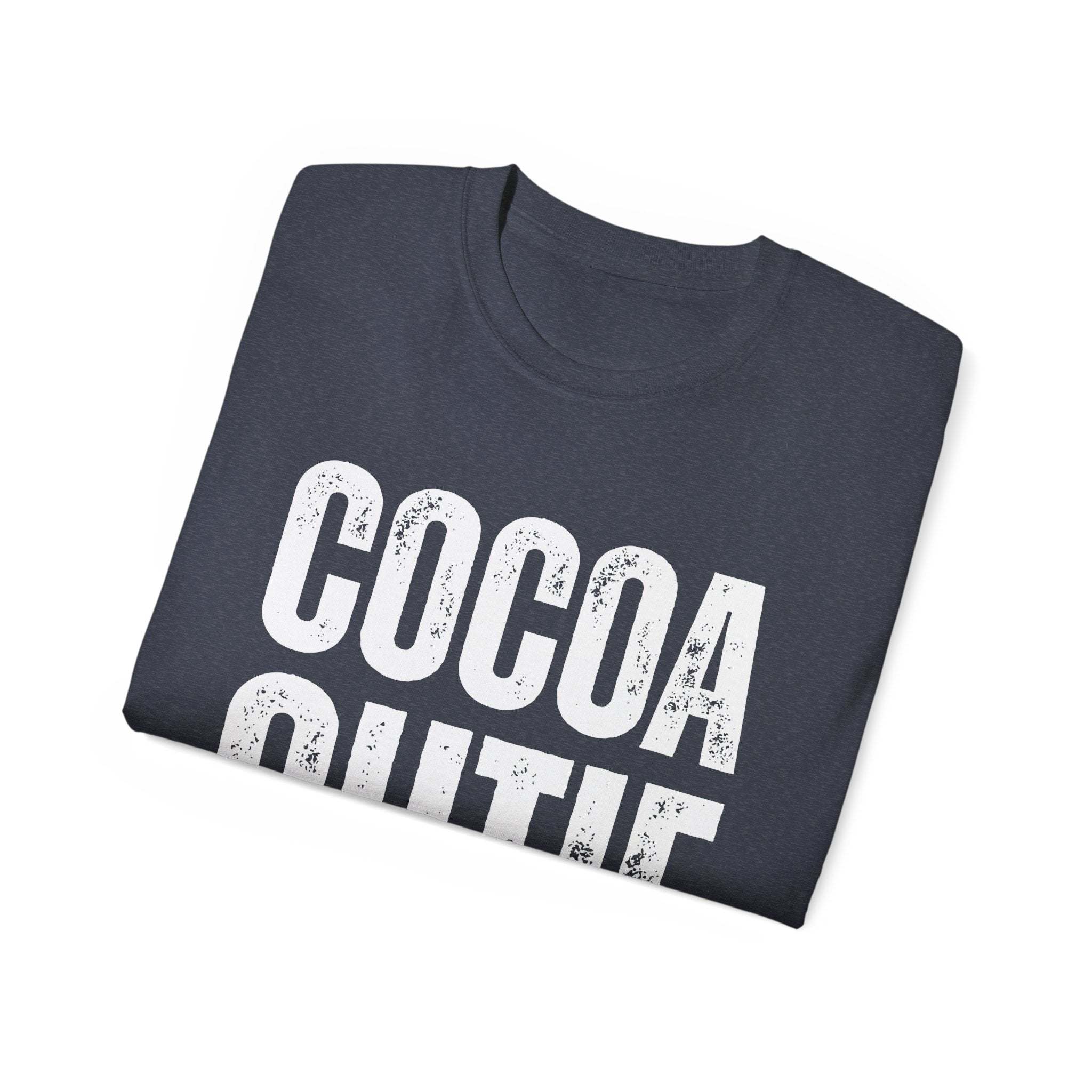 Folded distressed Cocoa Cutie Tee in dark color with white vintage text design
