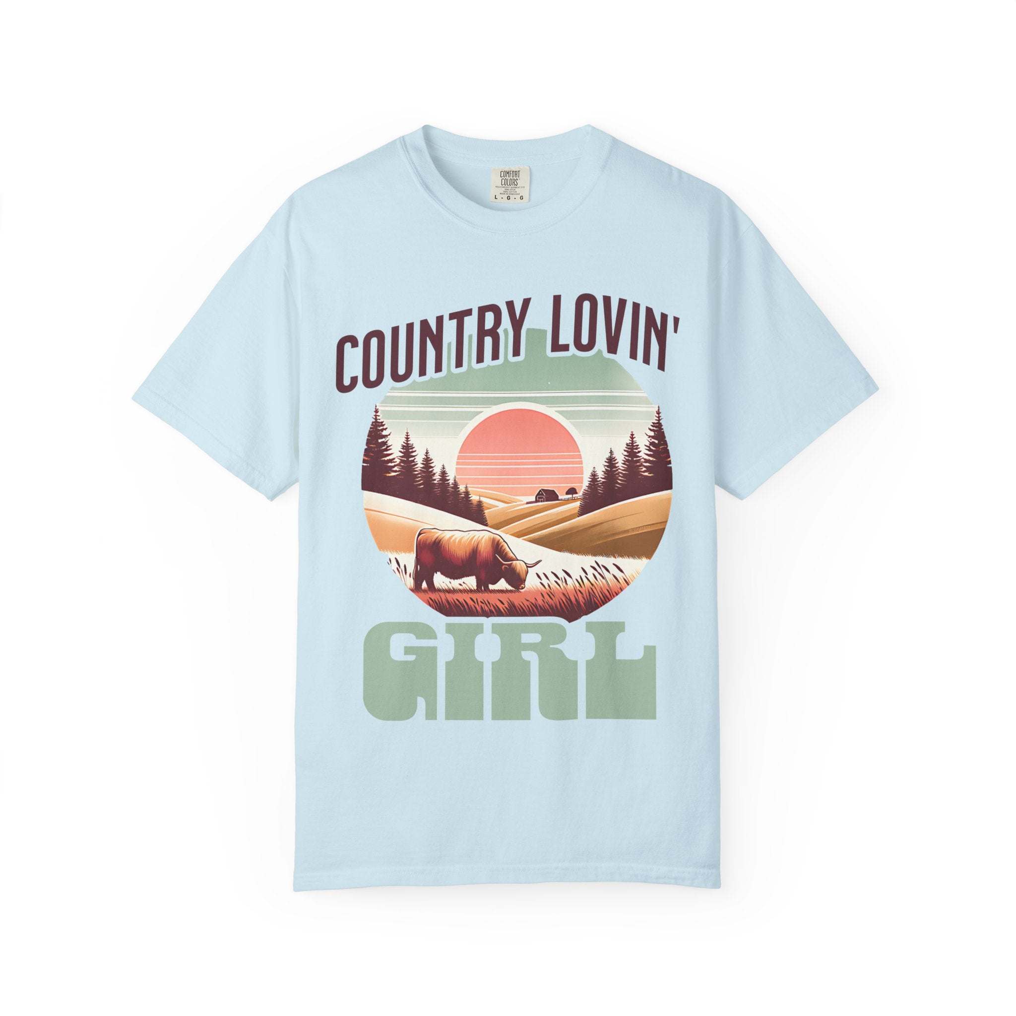 Light blue Country Lovin Girl T-shirt with vintage country sunset and cow graphic