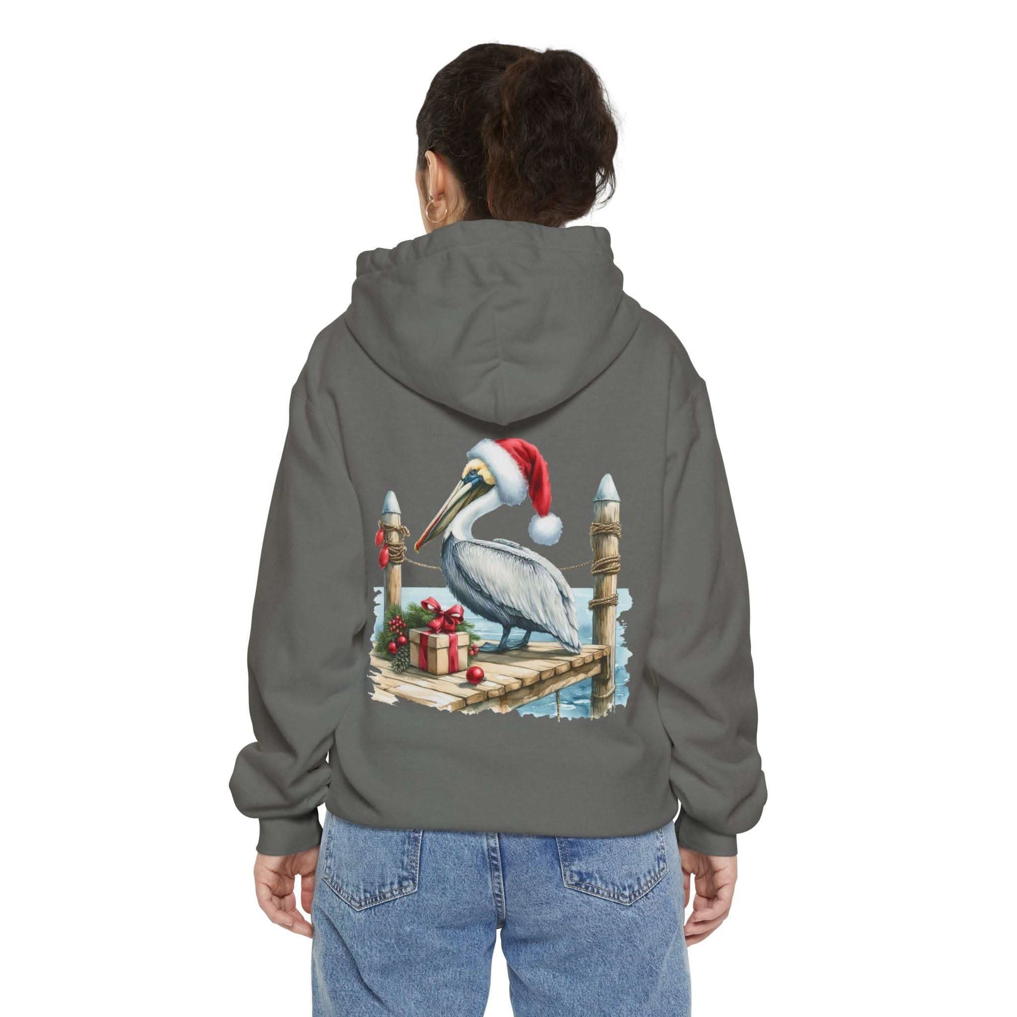 True Navy hoodie featuring a pelican in a Santa hat design by Printify