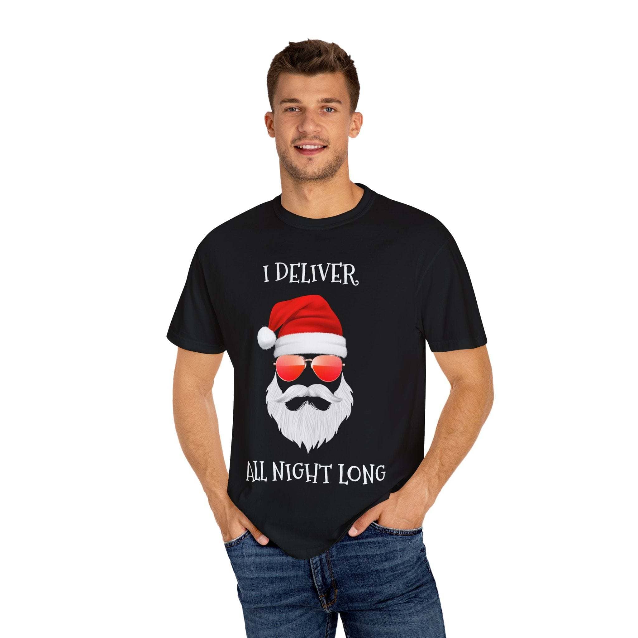 Santa I Deliver All Night Long black t-shirt with Santa graphic and festive text worn by smiling man