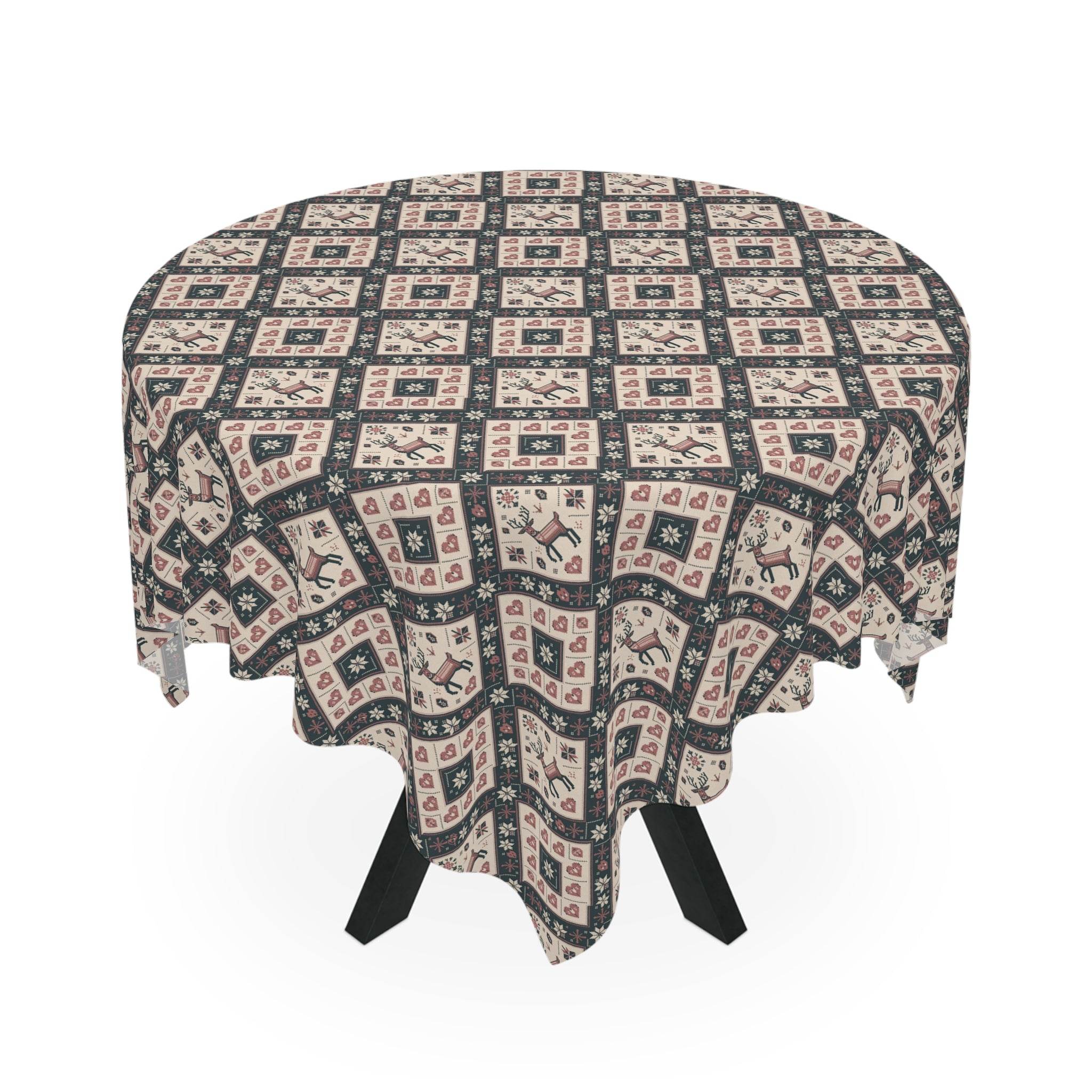 Round Winter Nordic Scandinavian tablecloth with festive reindeer and heart pattern on a dining table