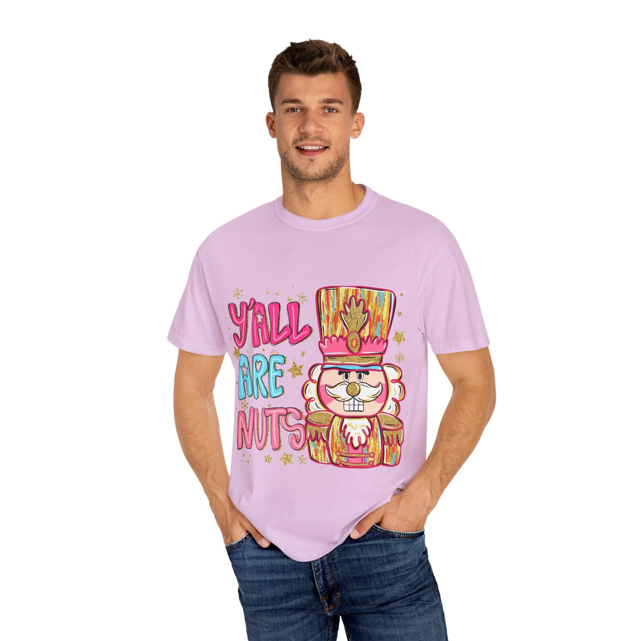 Man wearing pink Yall Are Nuts Nutcracker festive preppy cotton T-shirt