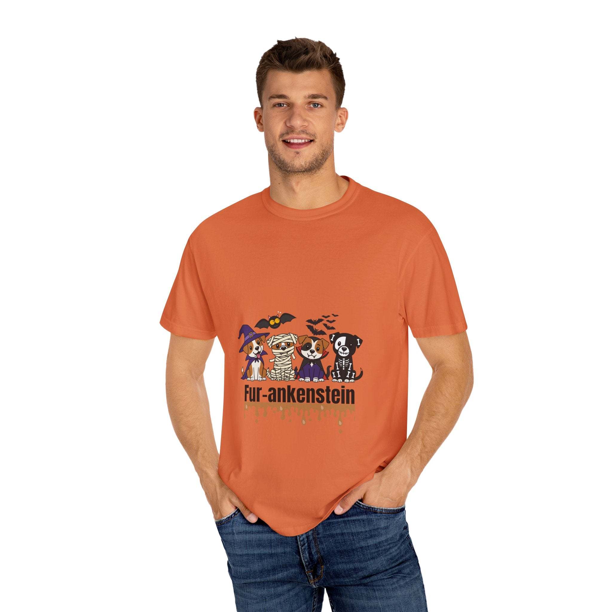 Man wearing orange Puppies Halloween T-shirt with puppies in costumes and "Fur-ankenstein" text