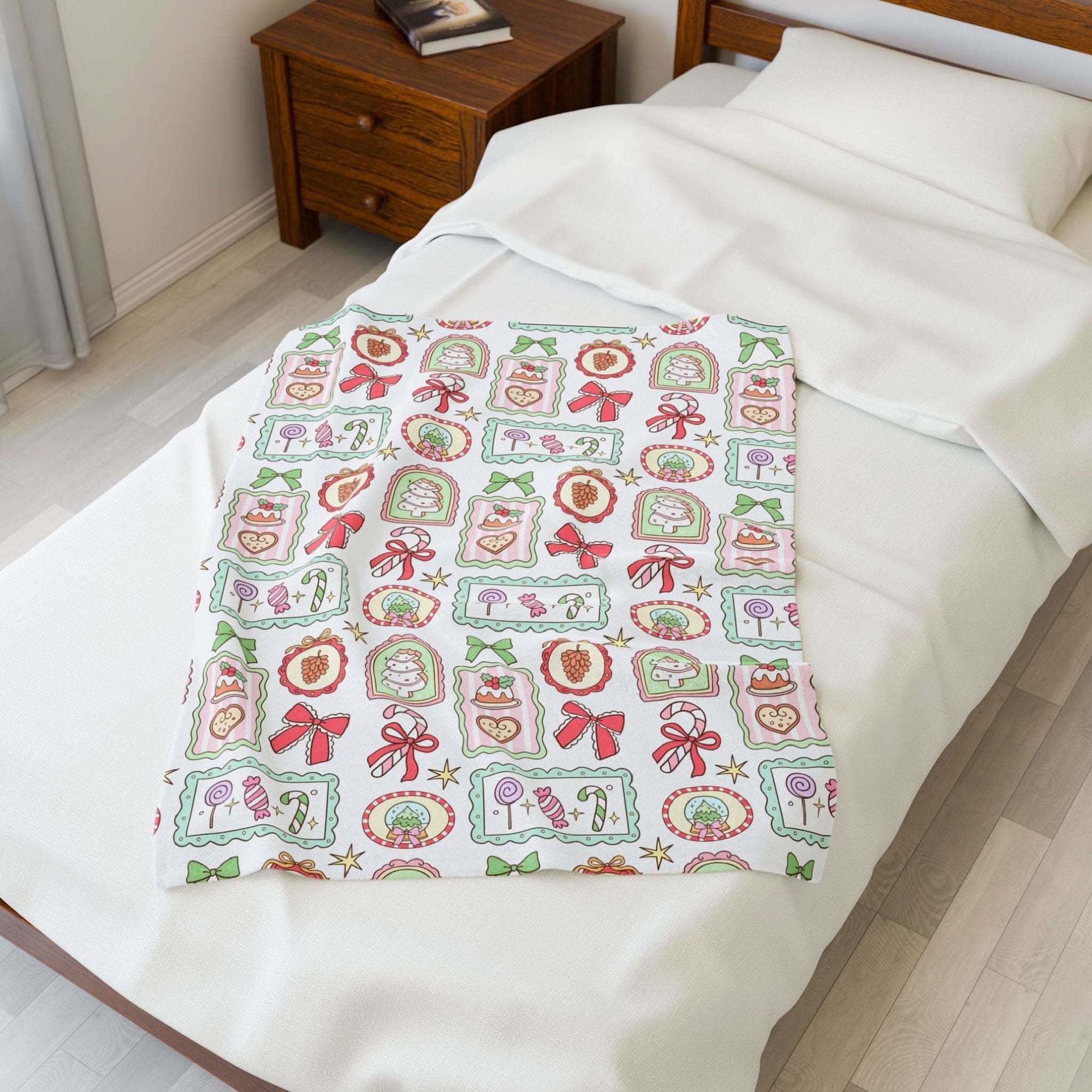 Velveteen plush blanket with retro Christmas frames design on bed for holiday decor