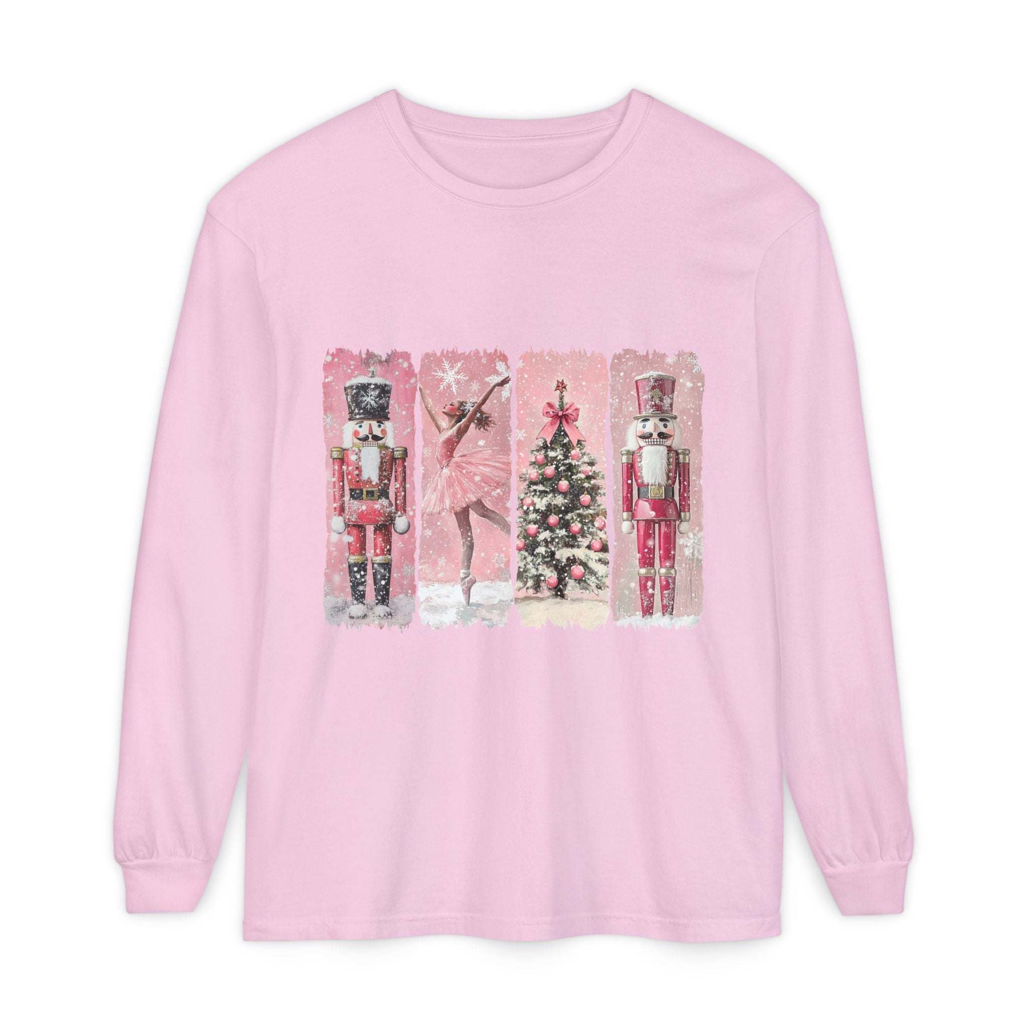 Preppy pink long sleeve t-shirt with watercolor Nutcracker and Christmas tree design, made of soft 100% cotton.