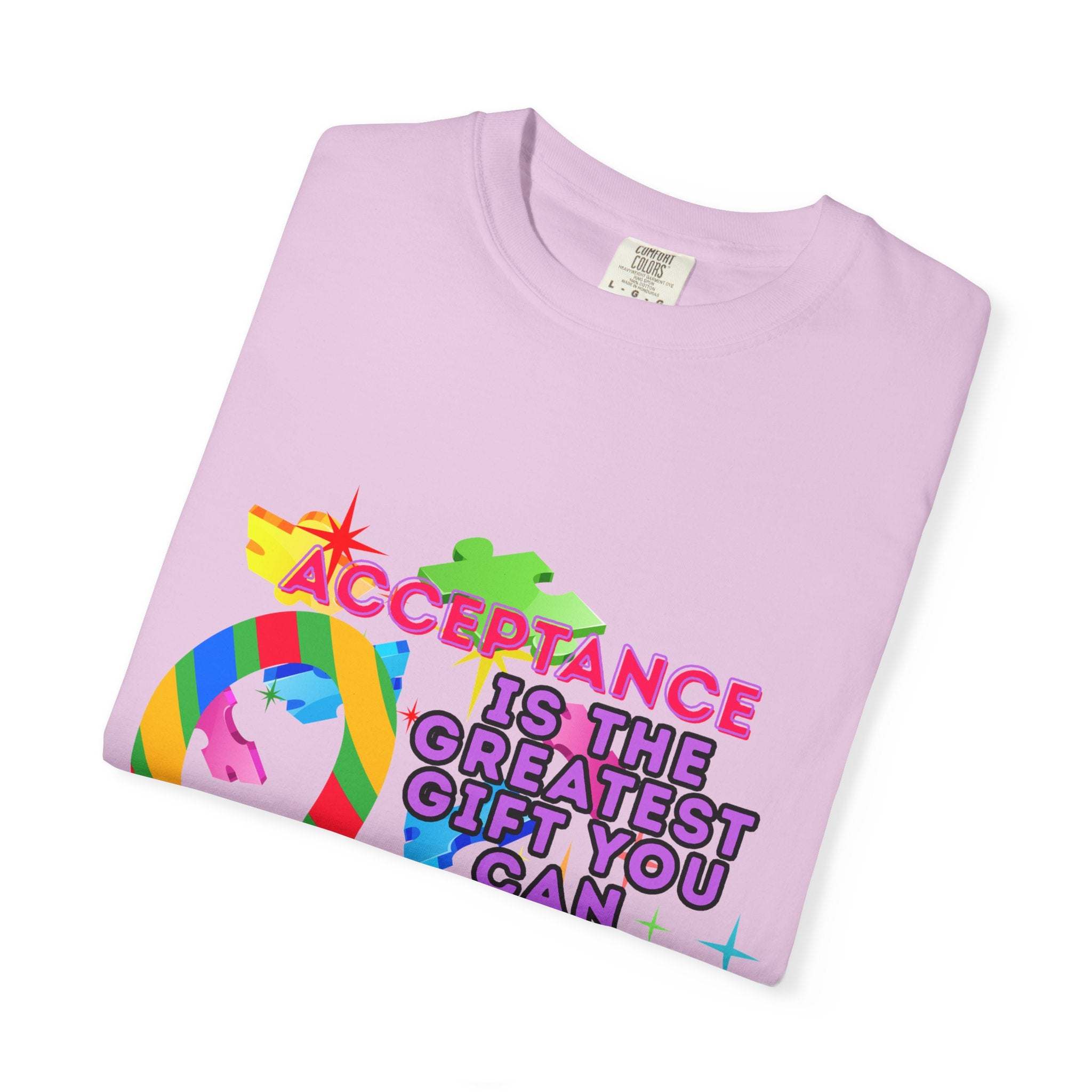 Garment-dyed lavender T-shirt with Autism Acceptance message and colorful puzzle design