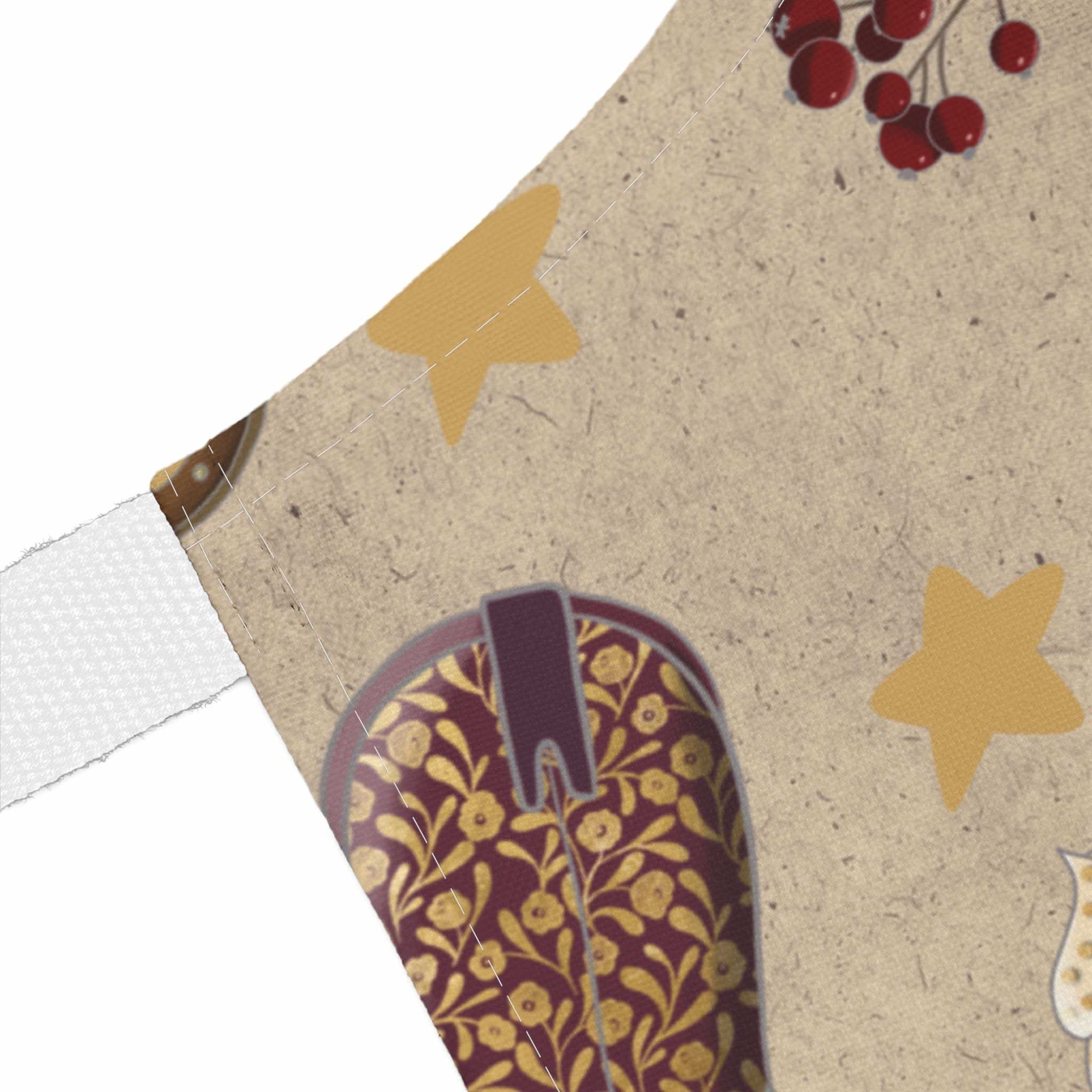 Cowboy Christmas apron with festive star and boot design on beige fabric, stain-resistant and comfortable for holiday cooking.