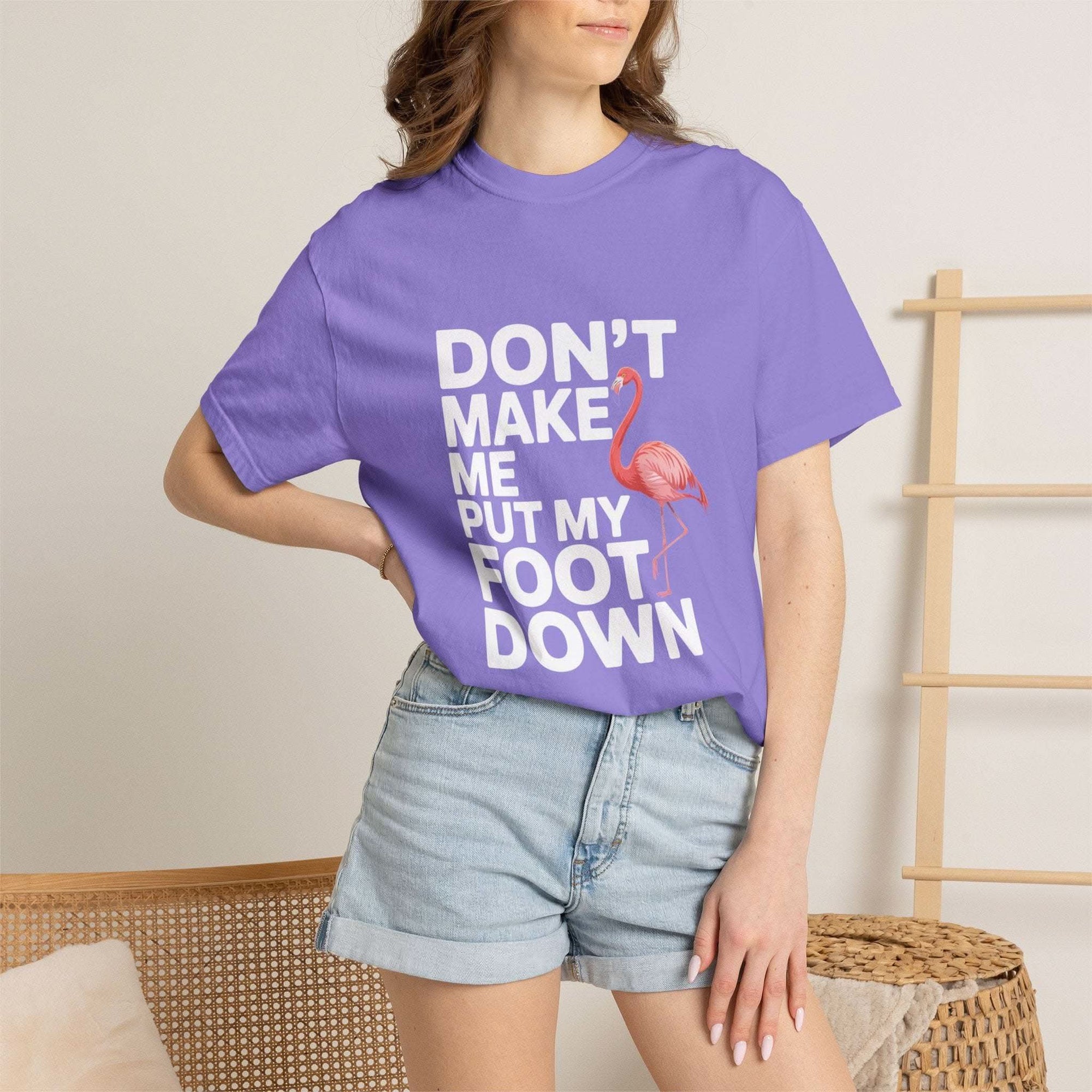 Dont Make Me Put My Foot Down flamingo graphic T-shirt with bold white text on vintage dyed cotton fabric