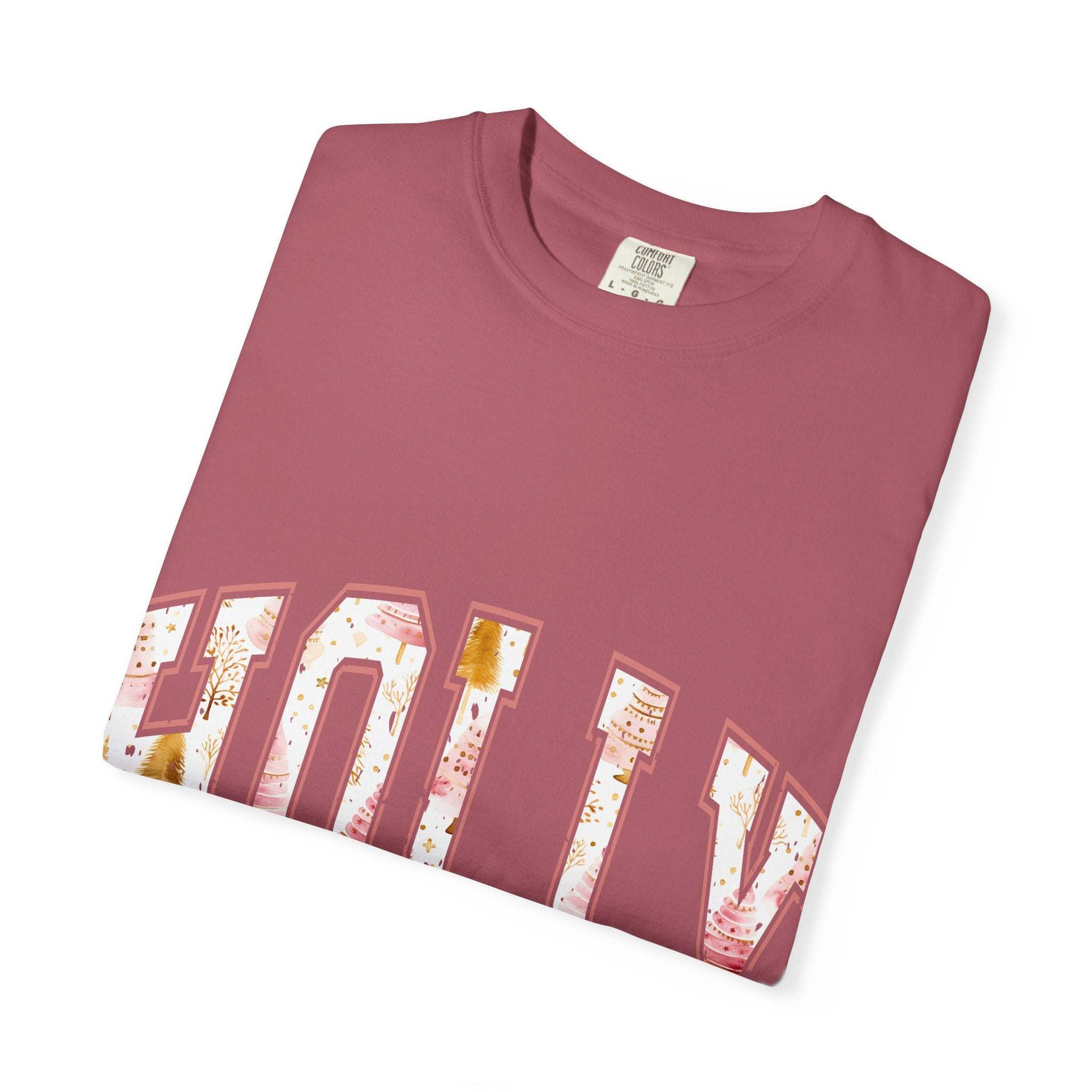Folded Varsity Holly Jolly T-shirt in festive pink garment-dyed cotton with holiday print