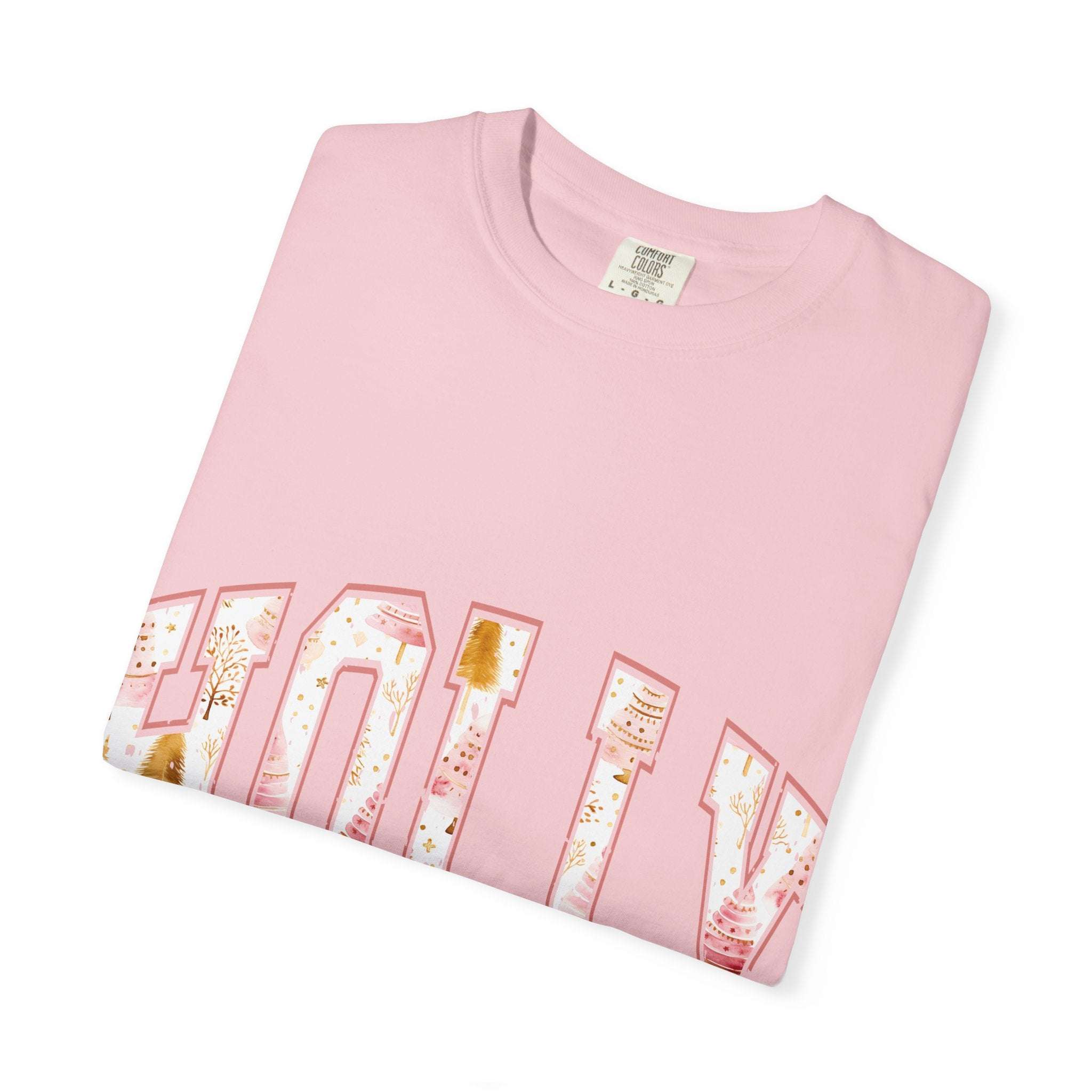 Pink Varsity Holly Jolly T-shirt with festive design, garment-dyed cotton, unisex relaxed fit