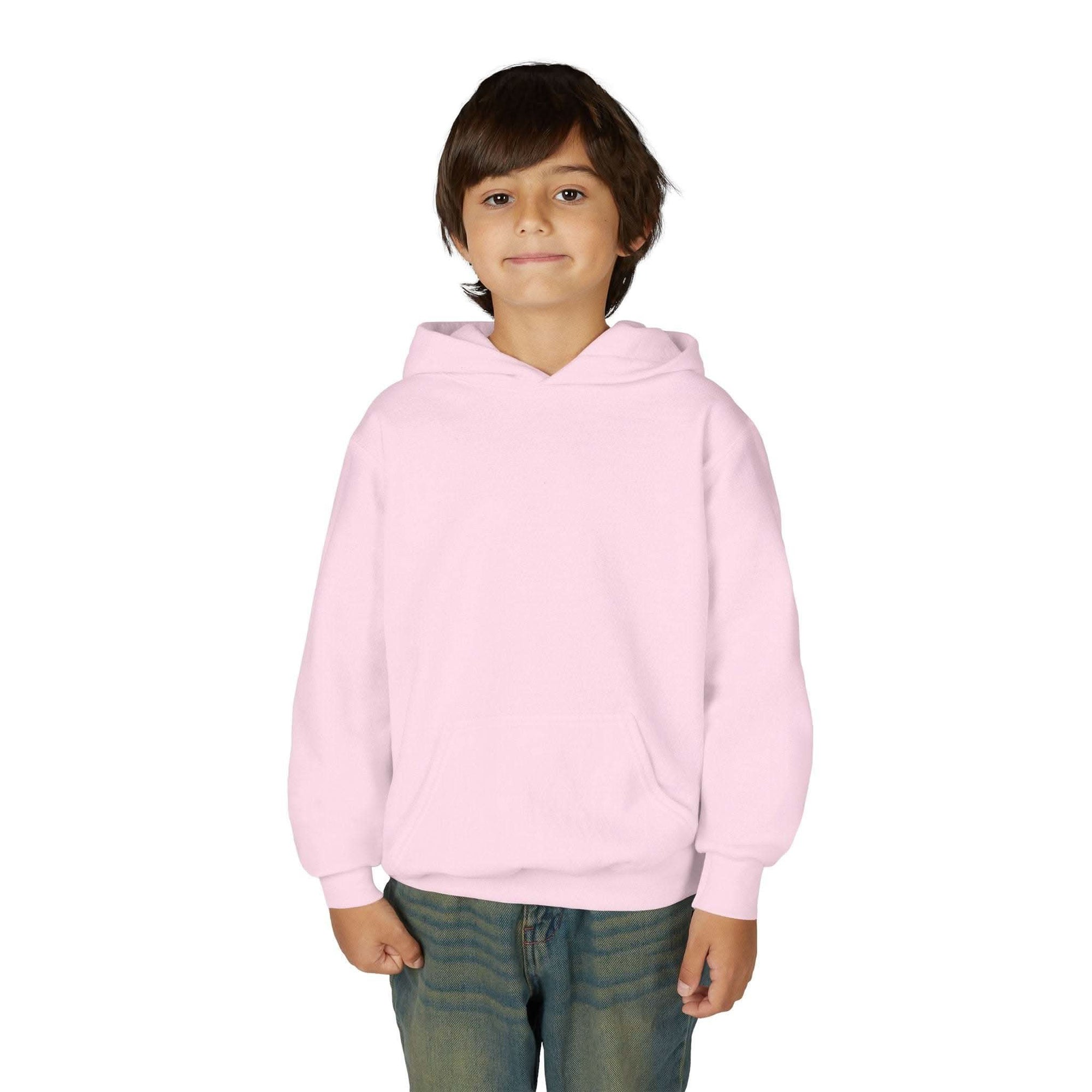 Child wearing navy Surfing Santa Hoodie with Santa surfing on wave graphic on back