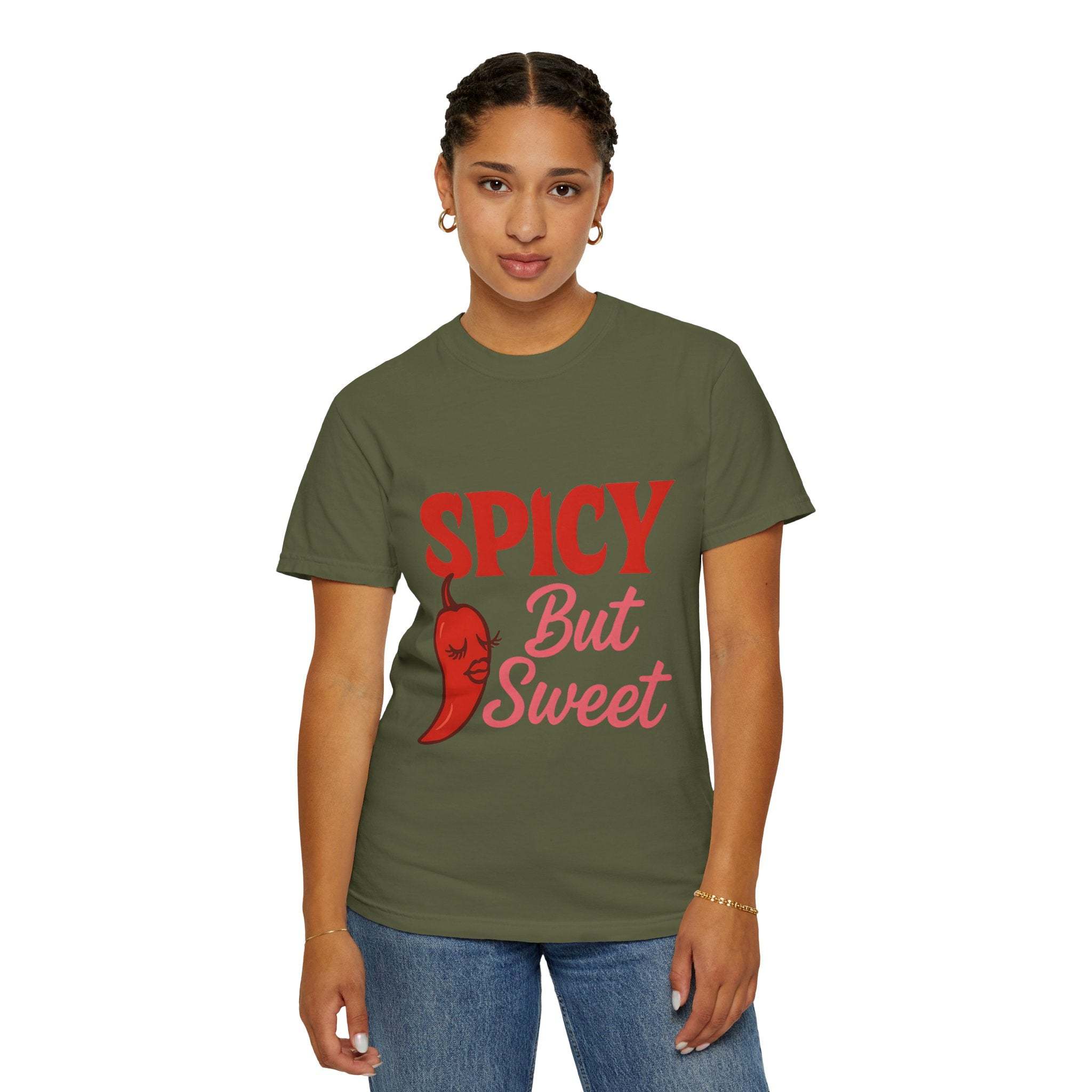 Woman wearing olive green Spicy But Sweet T-shirt with red chili graphic and text, casual unisex garment-dyed tee for foodies