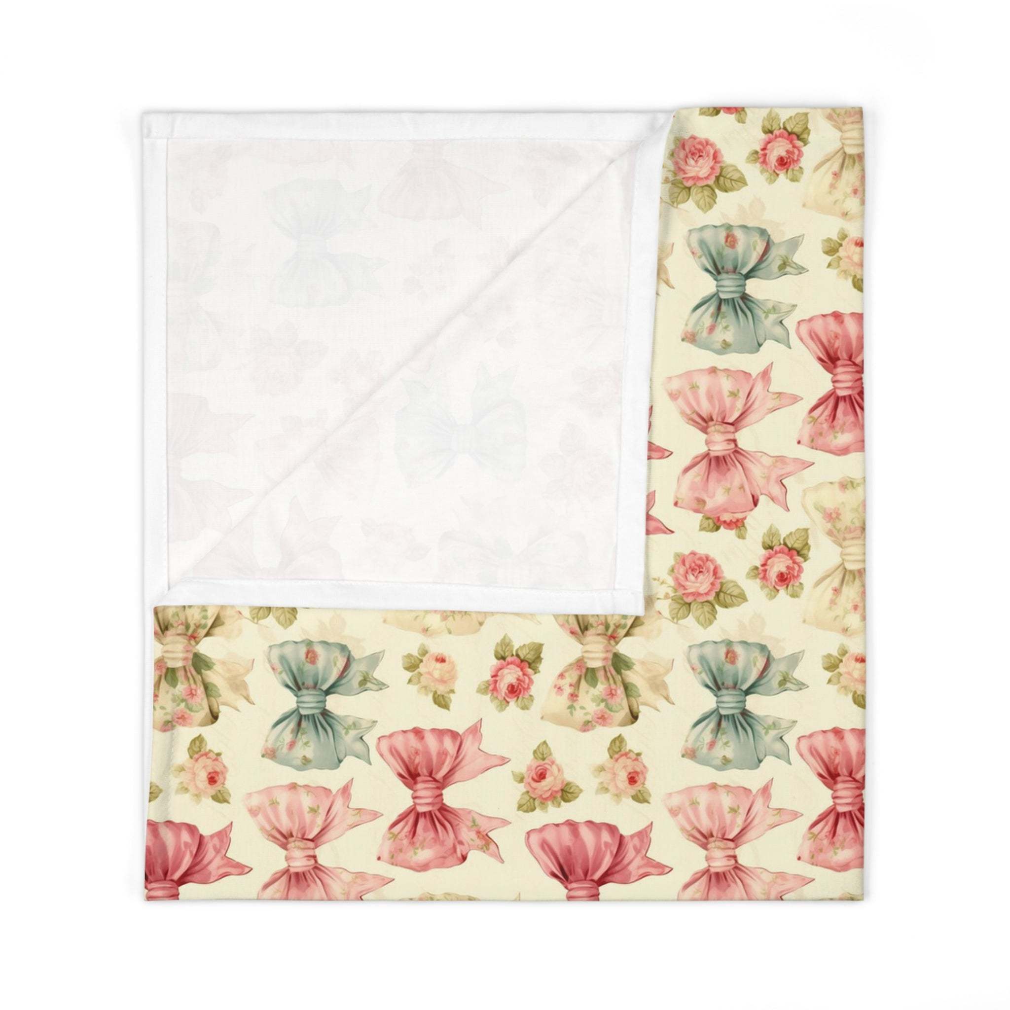 Floral Coquette Bows swaddle blanket with soft jersey fabric and vintage bow print