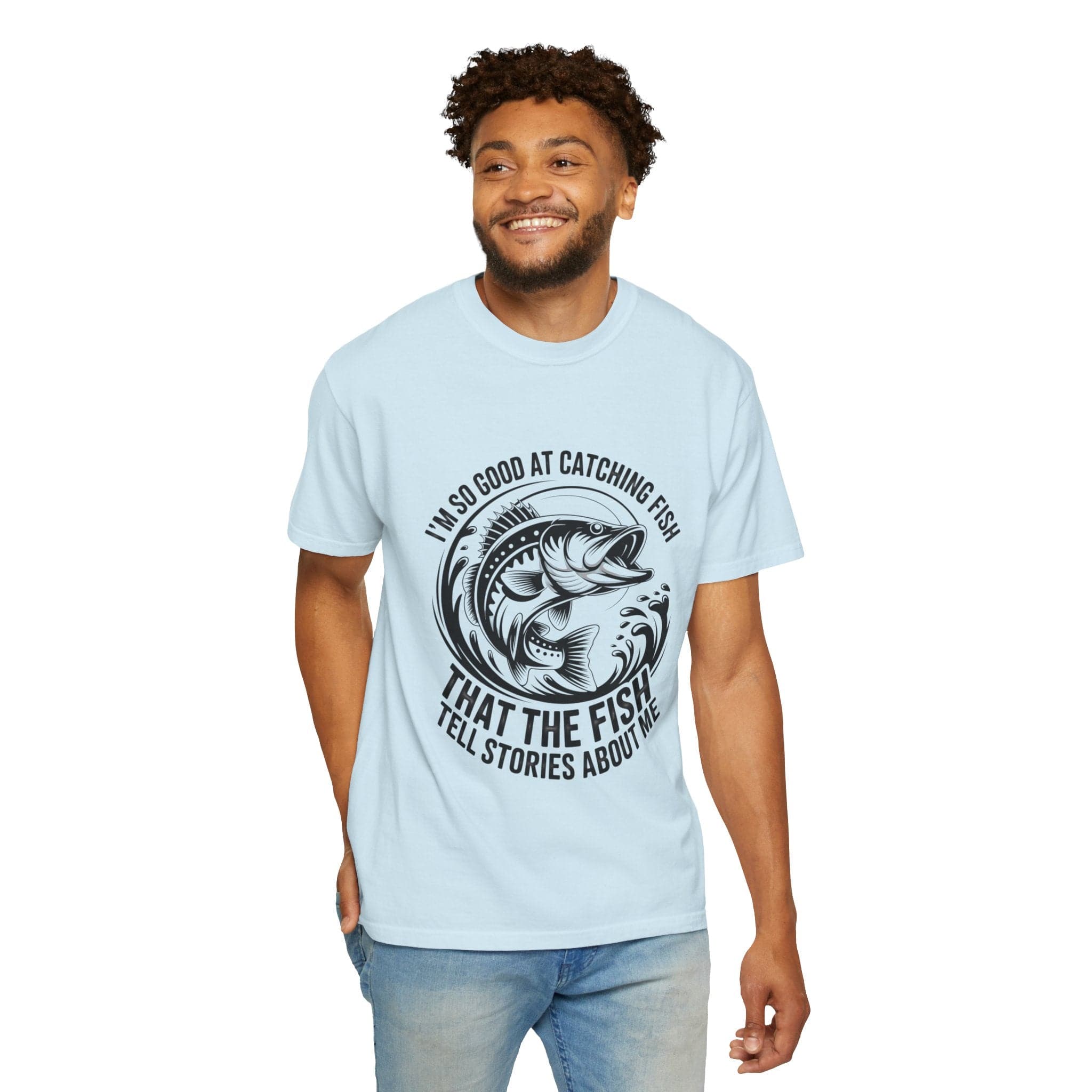 Relaxed fit light blue fishing t-shirt with “So Good At Catching Fish That The Fish Tell Stories About Me” text and fish graphic