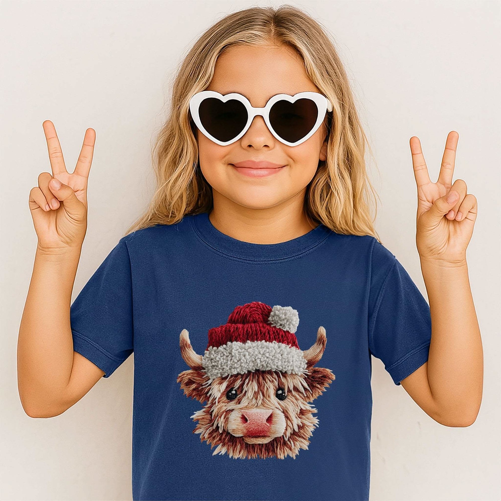 Youth tee featuring Santa Highland cow in faux crochet yarn style for Christmas