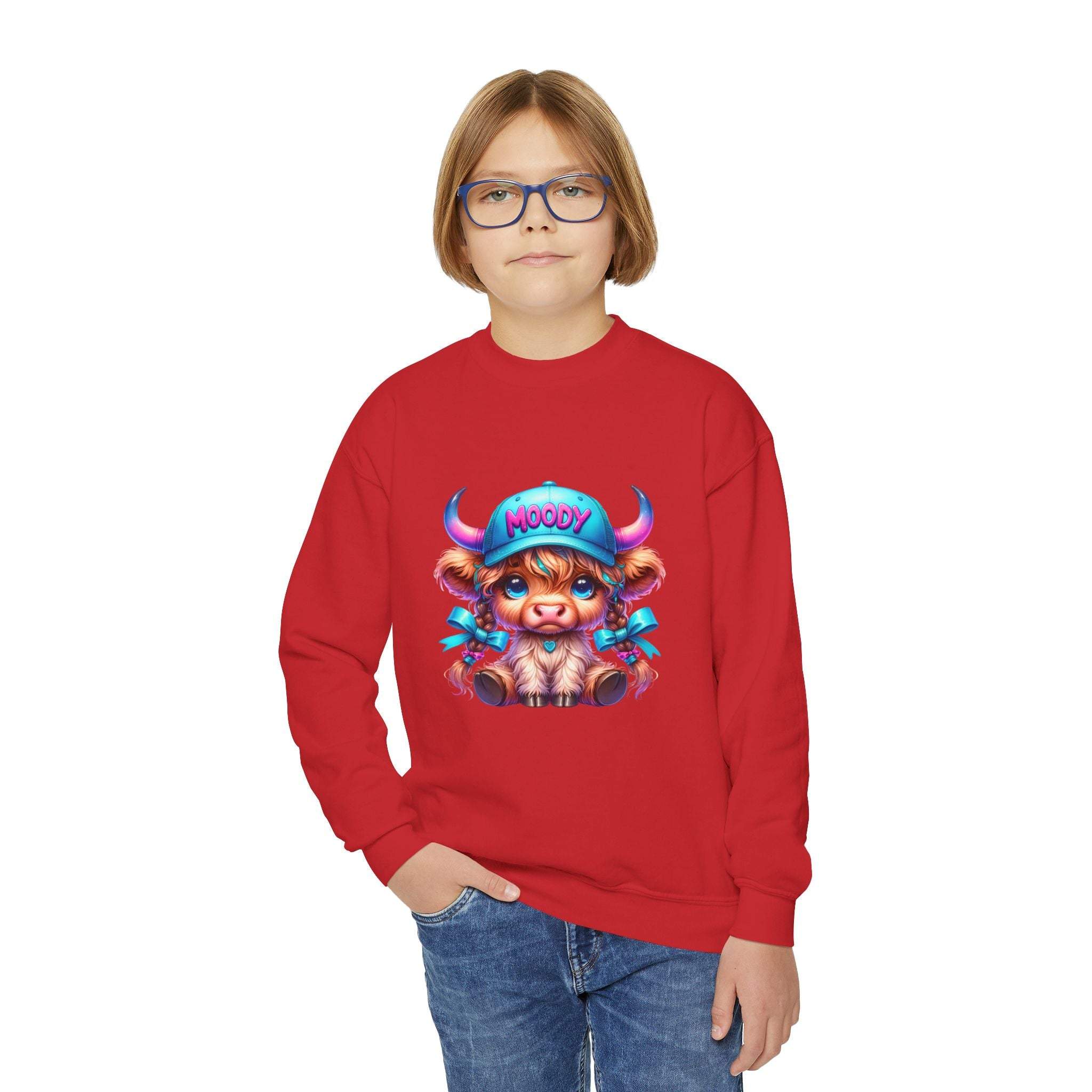 Child wearing red Moody Girl Highland Cow sweatshirt with colorful cartoon cow design